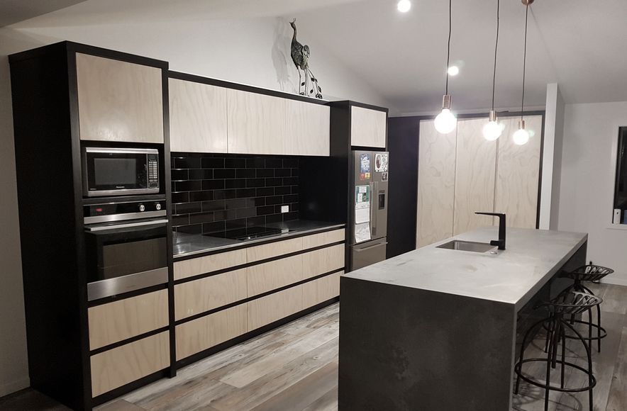 Black & Whitewashed plywood kitchen