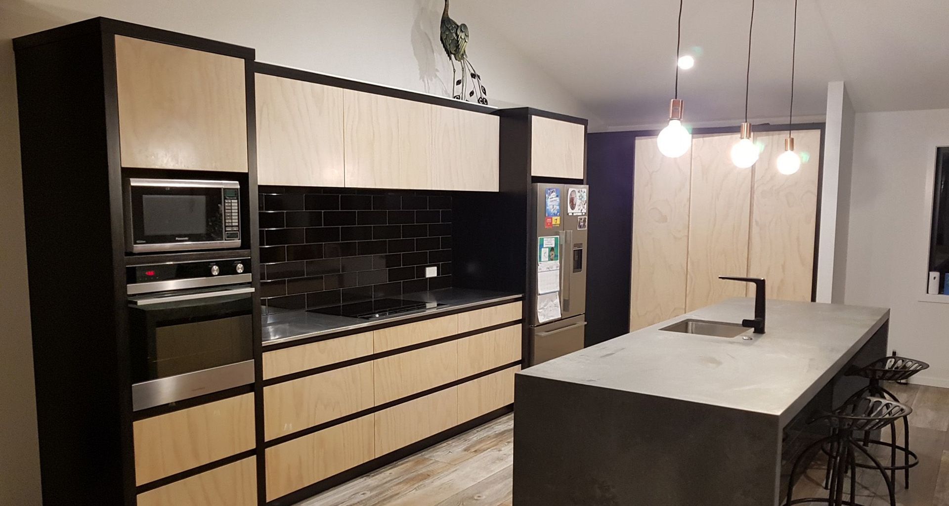 Black & Whitewashed plywood kitchen banner