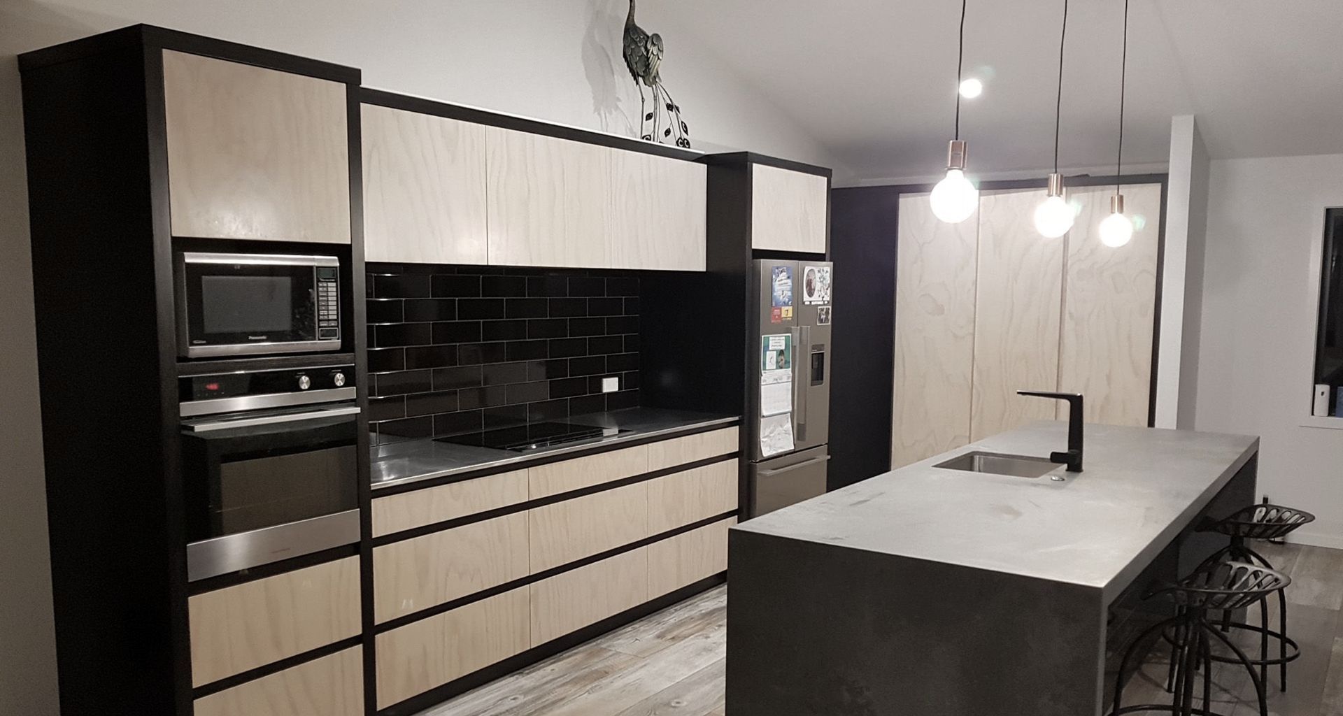 Black & Whitewashed plywood kitchen banner