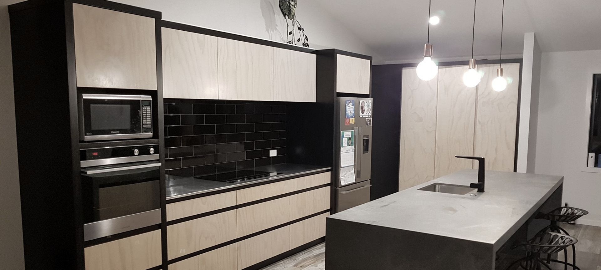 Black & Whitewashed plywood kitchen banner
