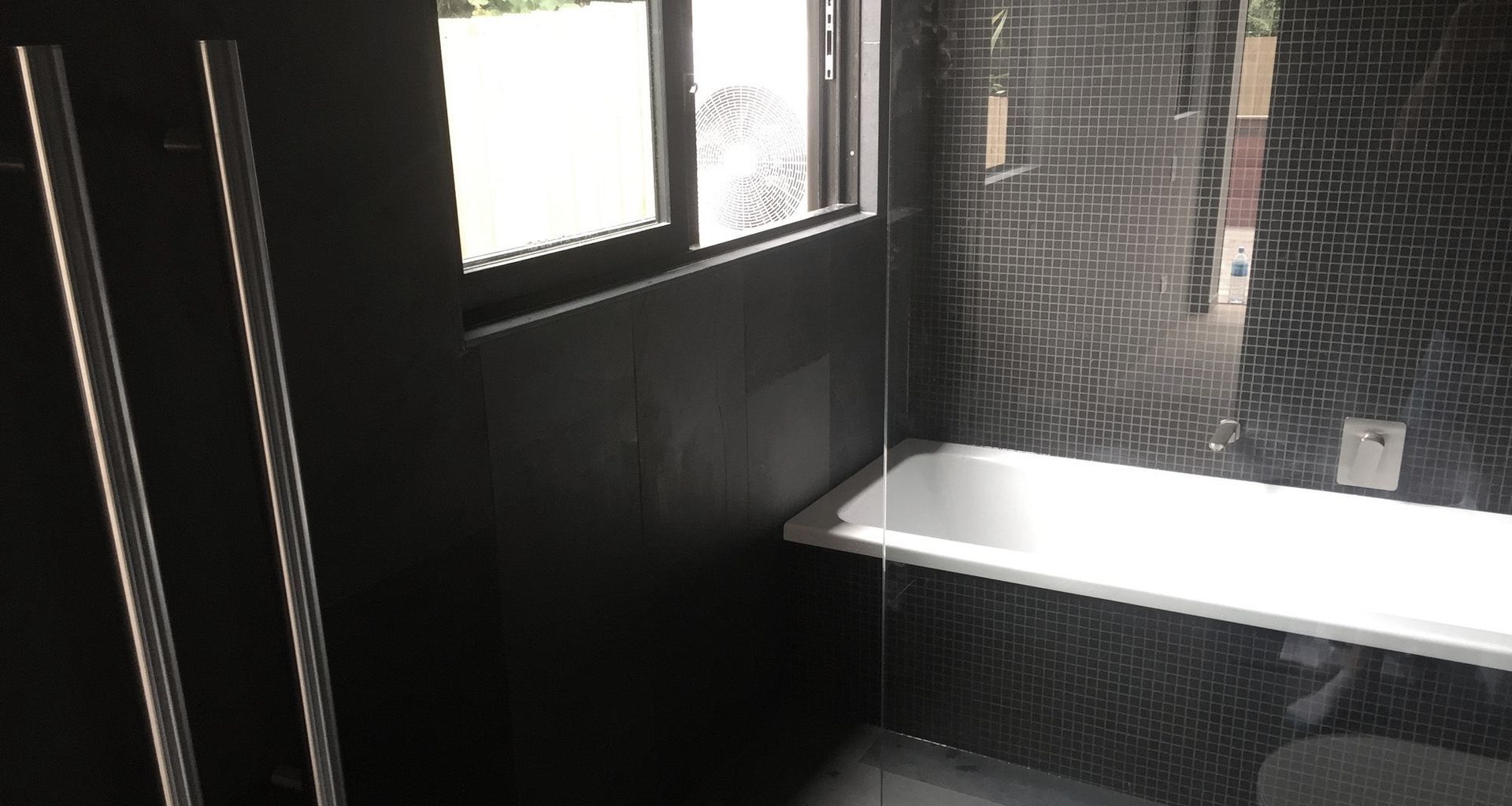 Black Tiled Bathroom banner