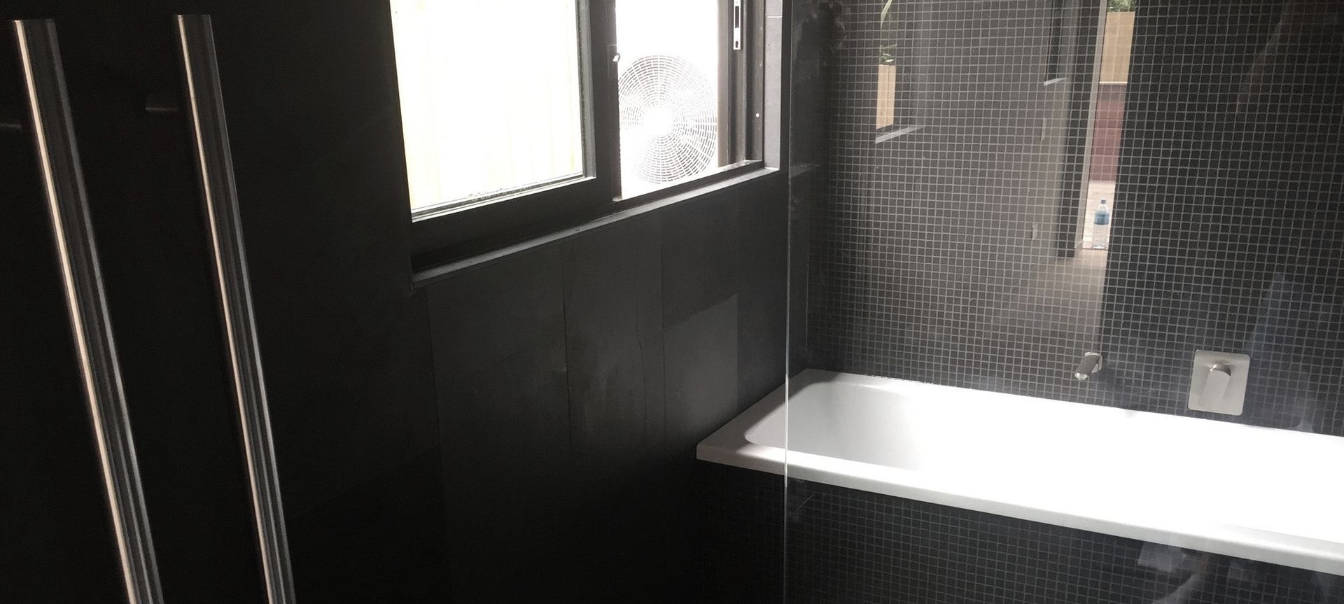Black Tiled Bathroom banner