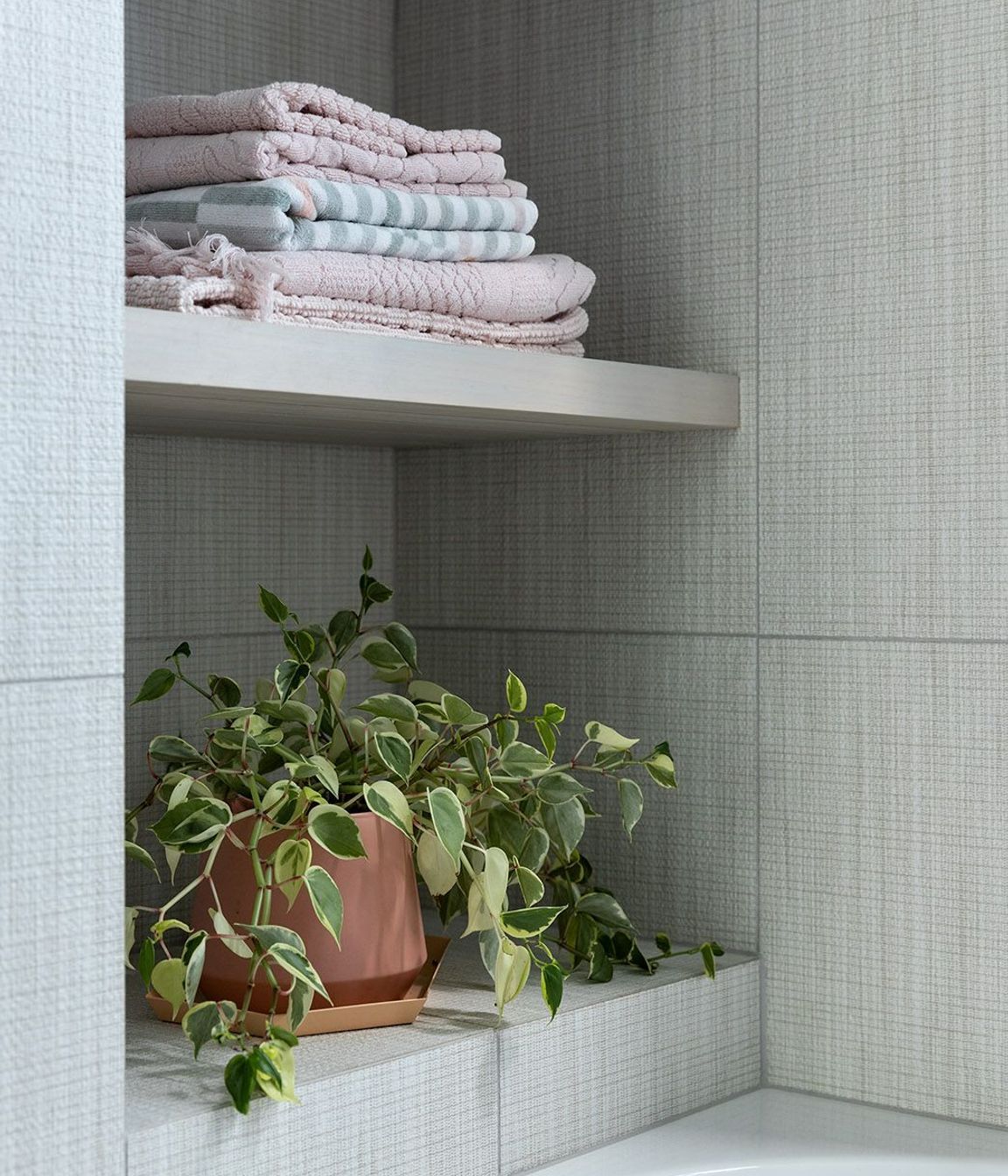 Built-in shelving in the bathroom.