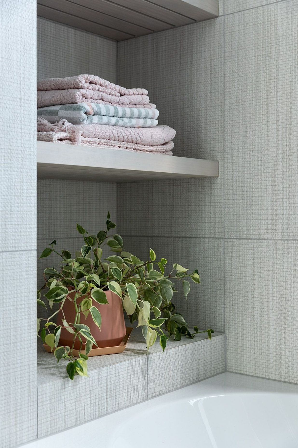 Built-in shelving in the bathroom.