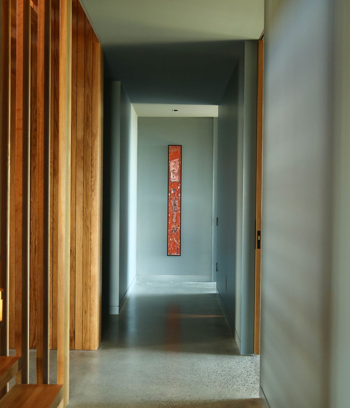 The lower level corridor, seen from the bottom of the staircase.