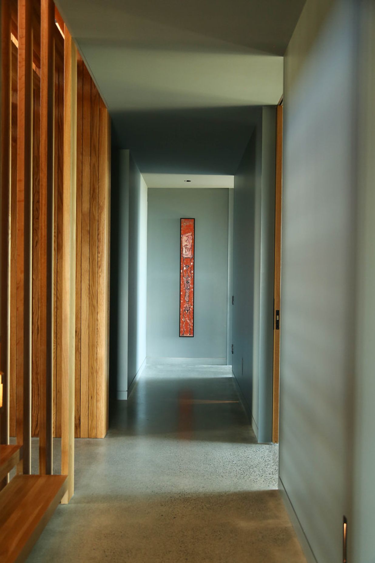 The lower level corridor, seen from the bottom of the staircase.