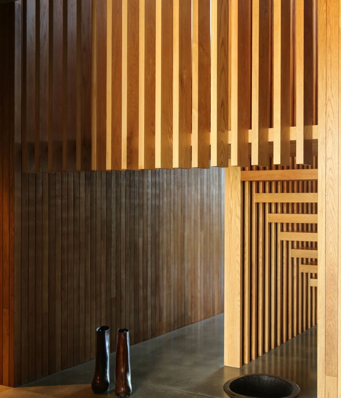 The gallery space under the timber staircase.