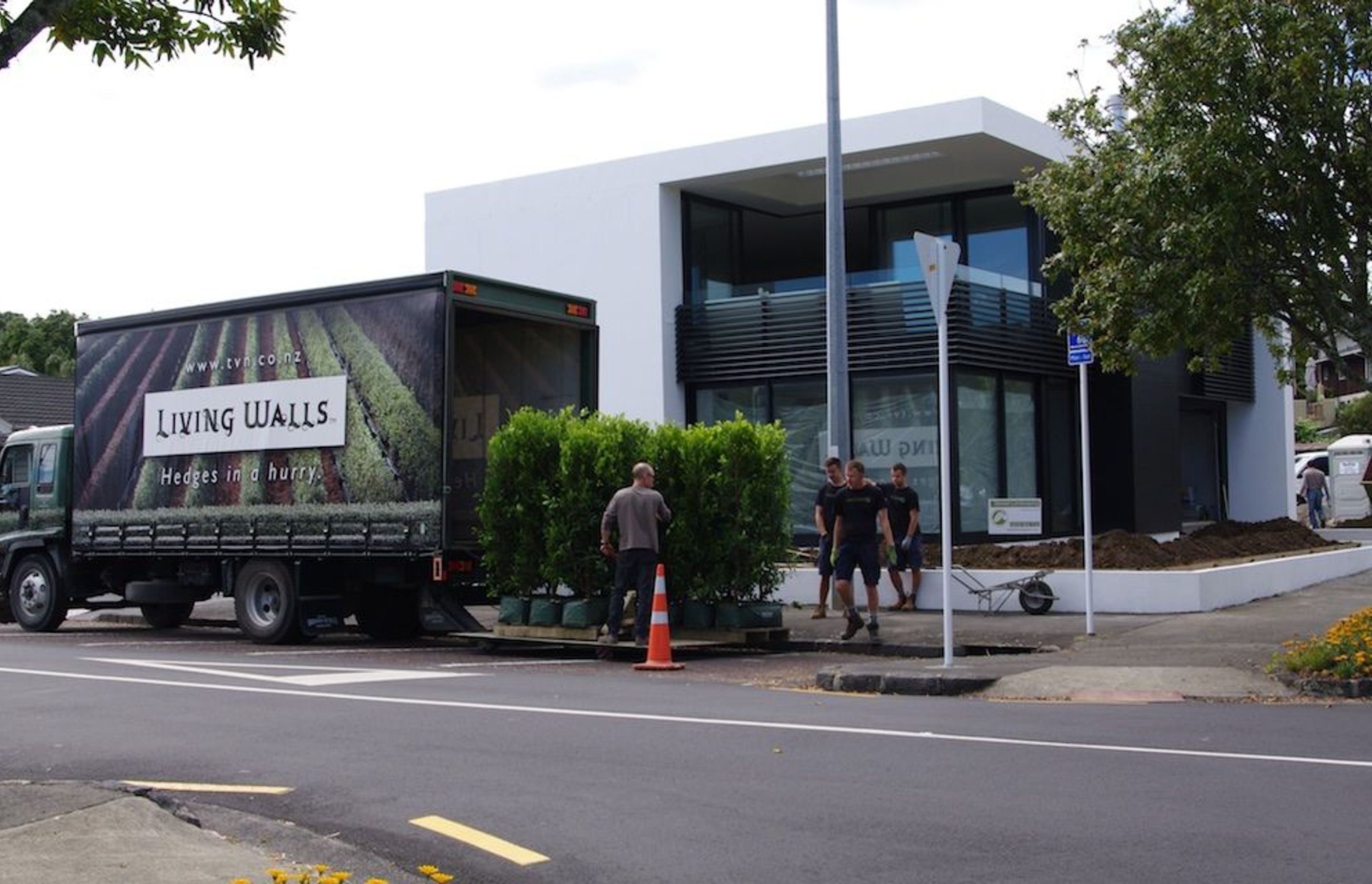 Landscapers and instant hedges - ready to transform the house into a home. 