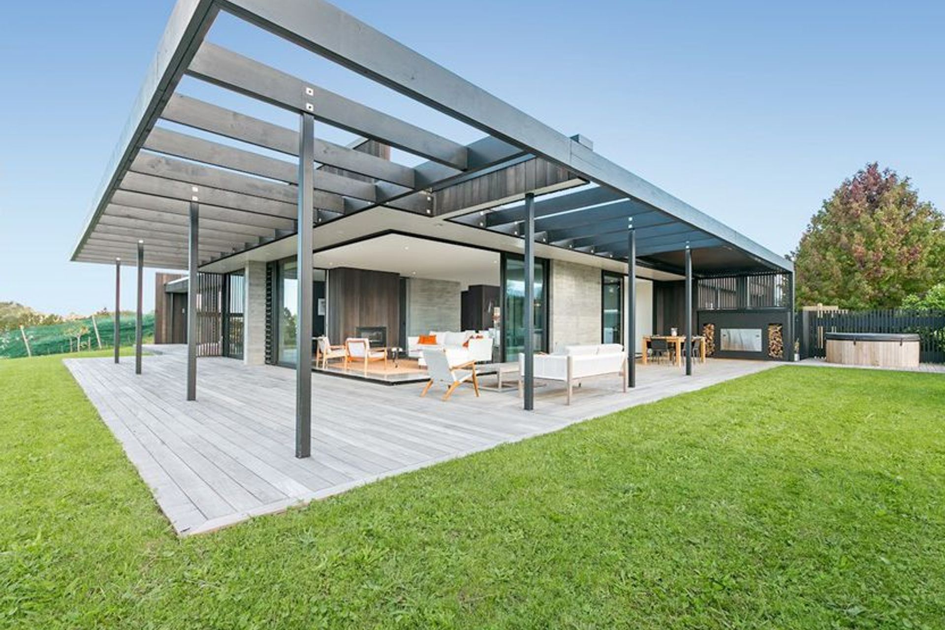 A high level of technical skill was required in the realisation of this striking home. Cedar cladding and Timber-grain, in situ board-form concrete walls marry these materials perfectly.