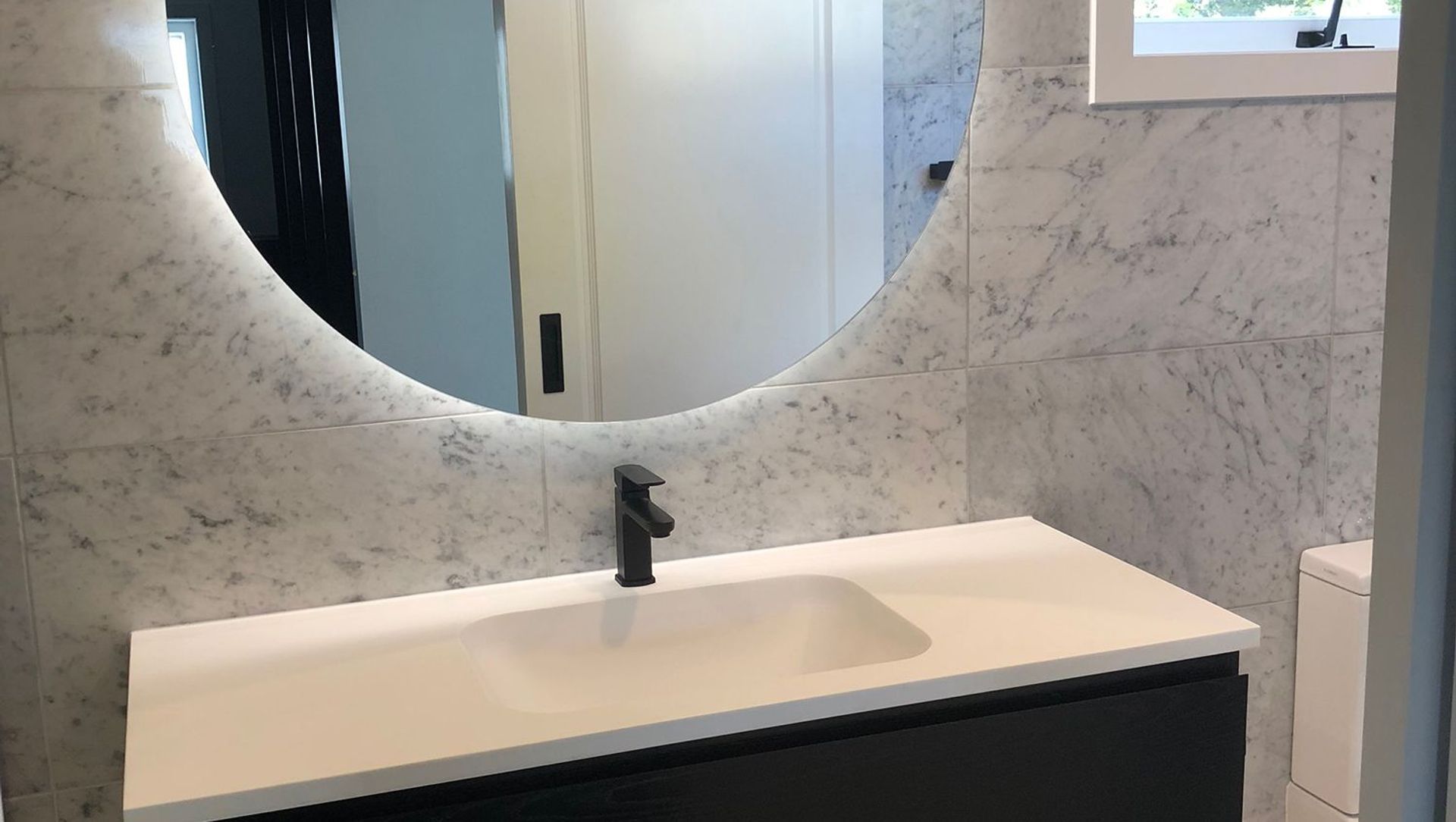 Carrara Tiled Bathroom banner