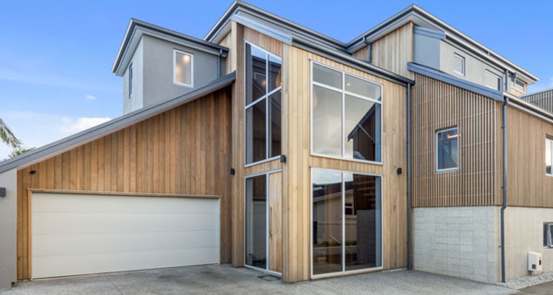 Clad in Cedar timber this Mount Maunganui home sits well in the coastal environment with wonderful water views as the backdrop.