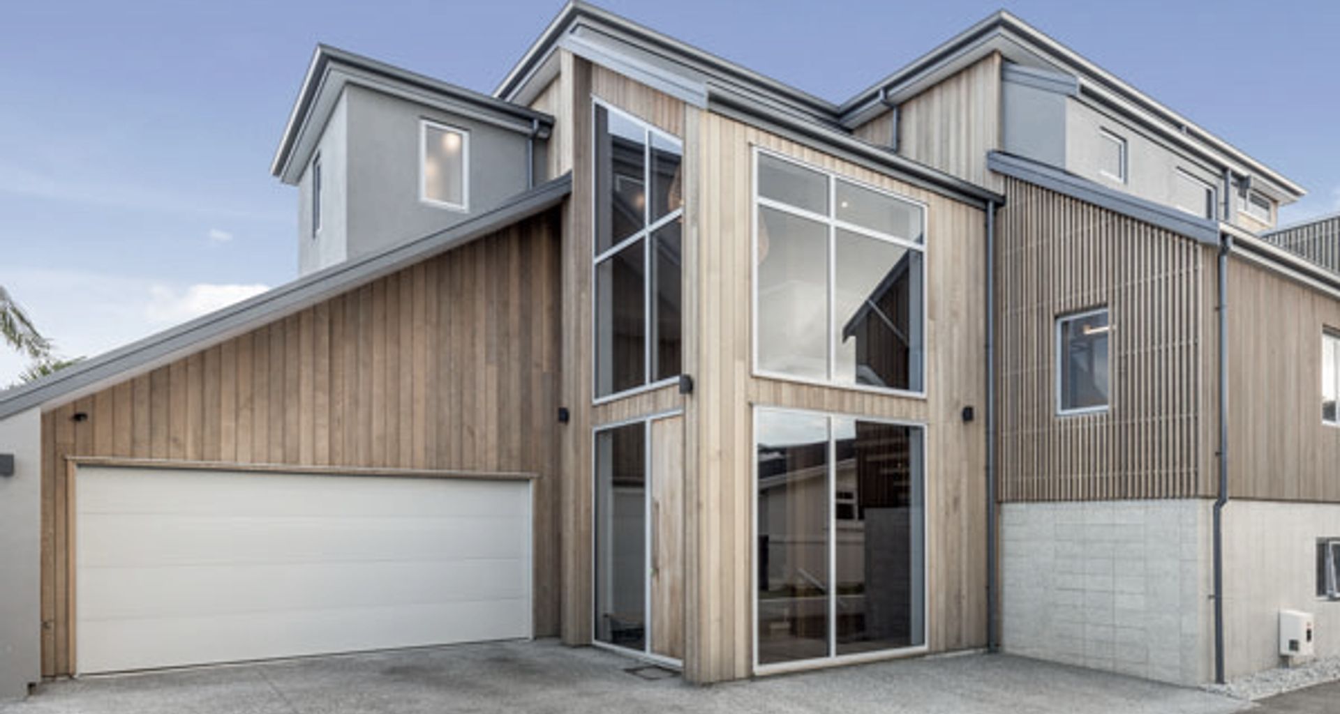 Clad in Cedar timber this Mount Maunganui home sits well in the coastal environment with wonderful water views as the backdrop.