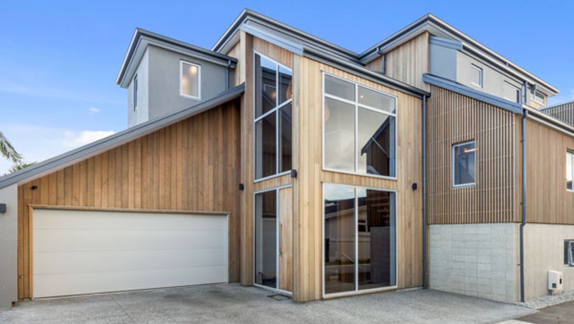 Clad in Cedar timber this Mount Maunganui home sits well in the coastal environment with wonderful water views as the backdrop.
