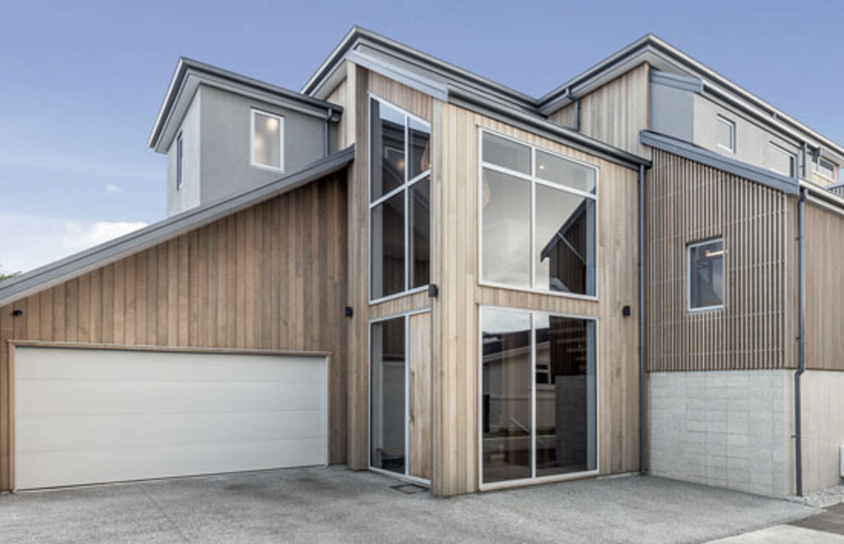 Clad in Cedar timber this Mount Maunganui home sits well in the coastal environment with wonderful water views as the backdrop.