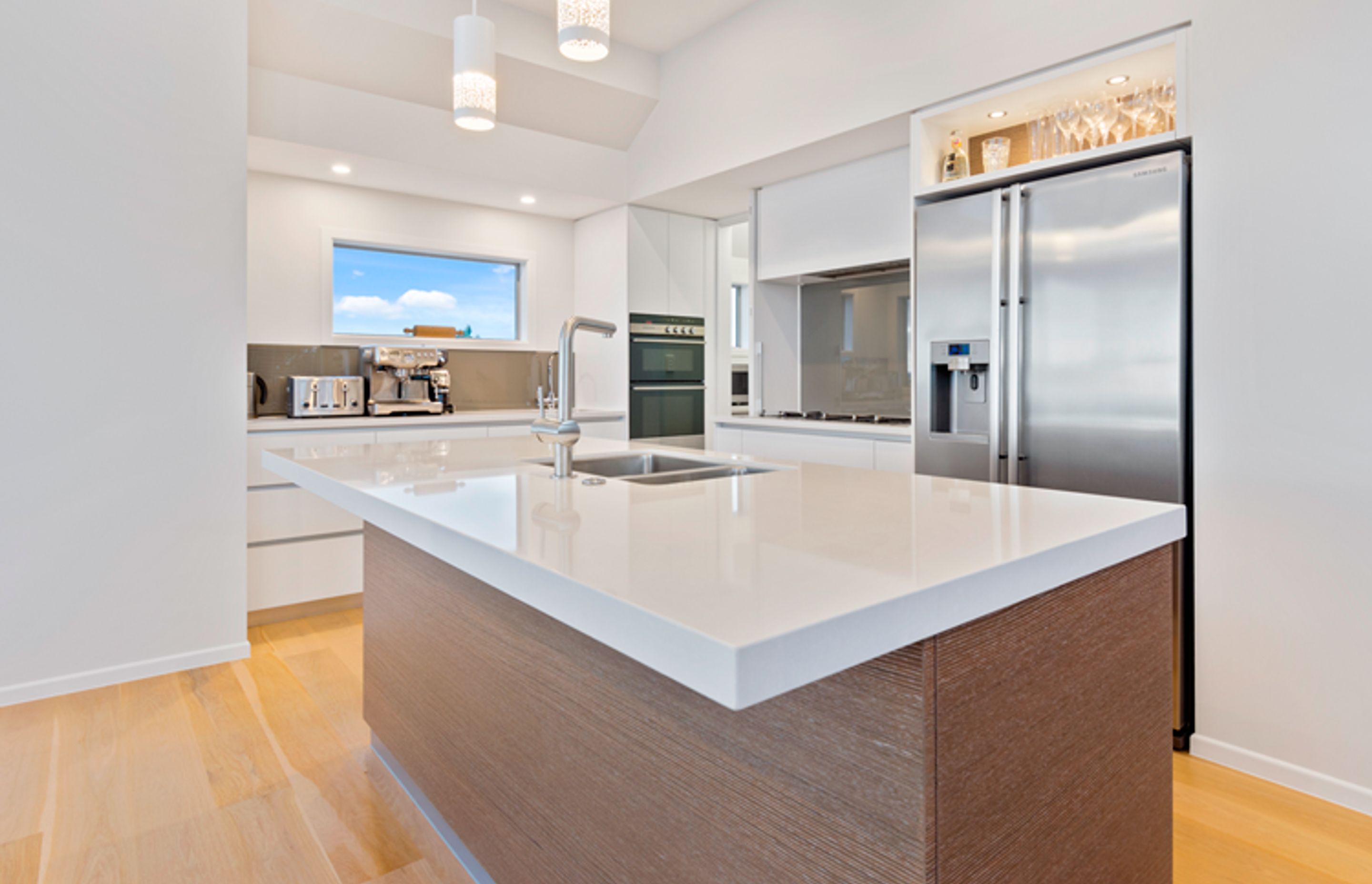 Open plan family kitchen designed for entertaining and enjoying life at the beach. 