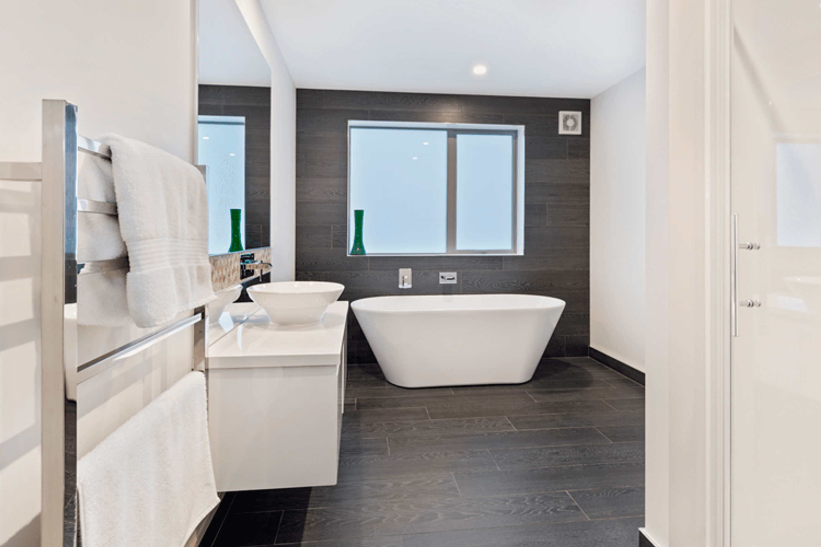 With four bedrooms, three bathrooms and three living areas, this is beach living at its best.