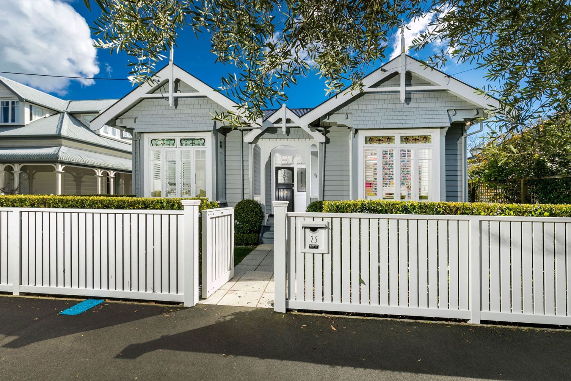 The front facade was a double bay villa with period stained glass windows.