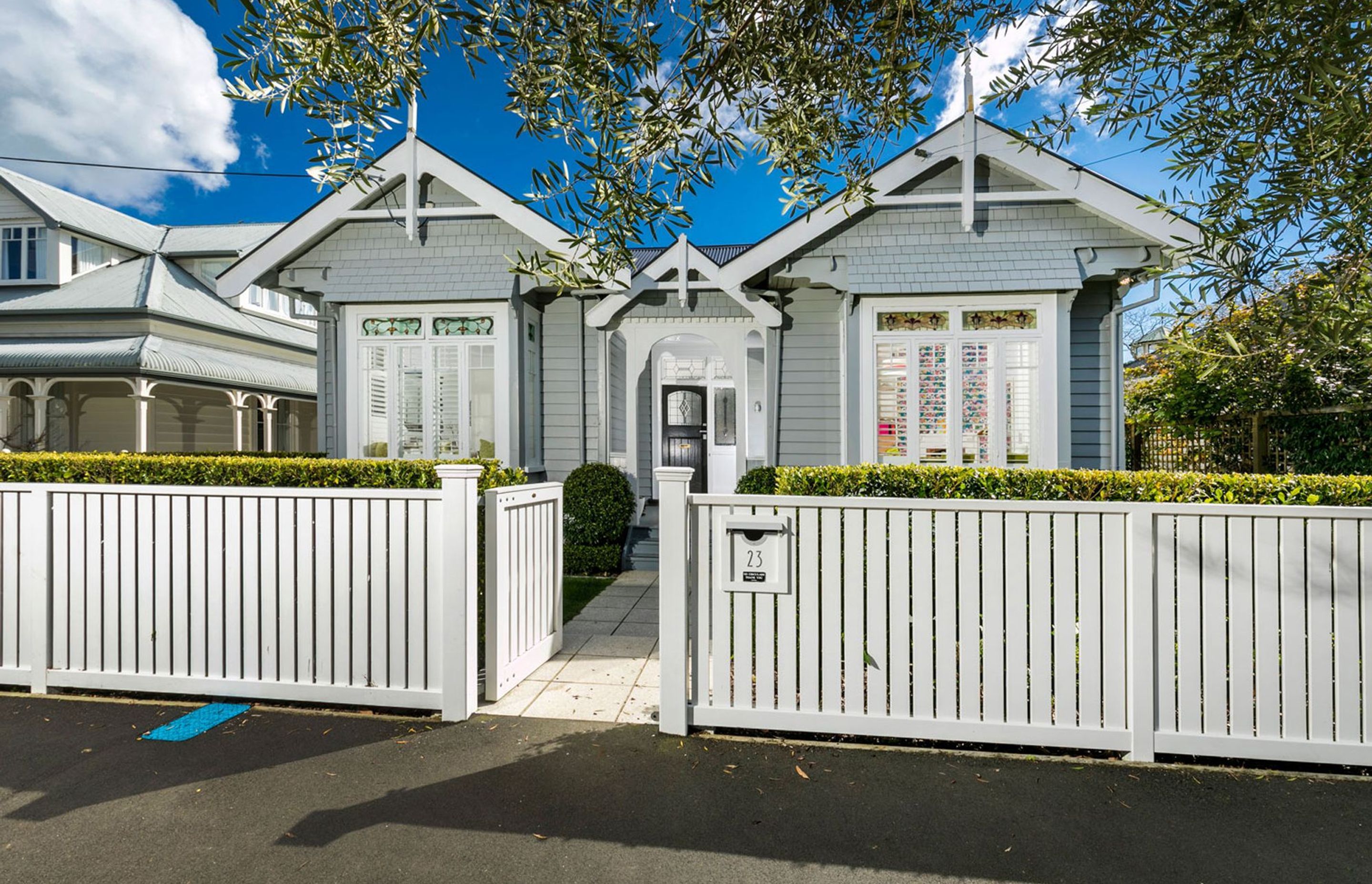 The front facade was a double bay villa with period stained glass windows.