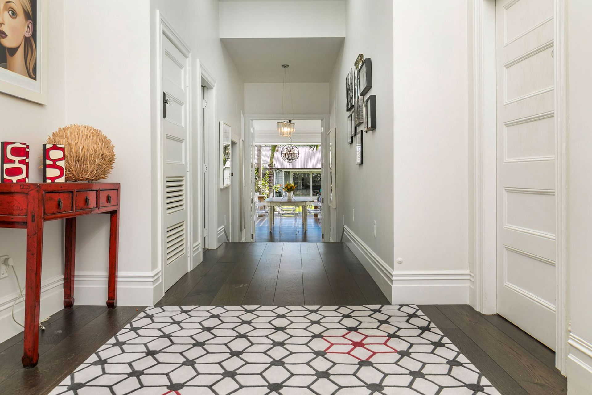 The eye was led down a wide hallway through to the outdoors.