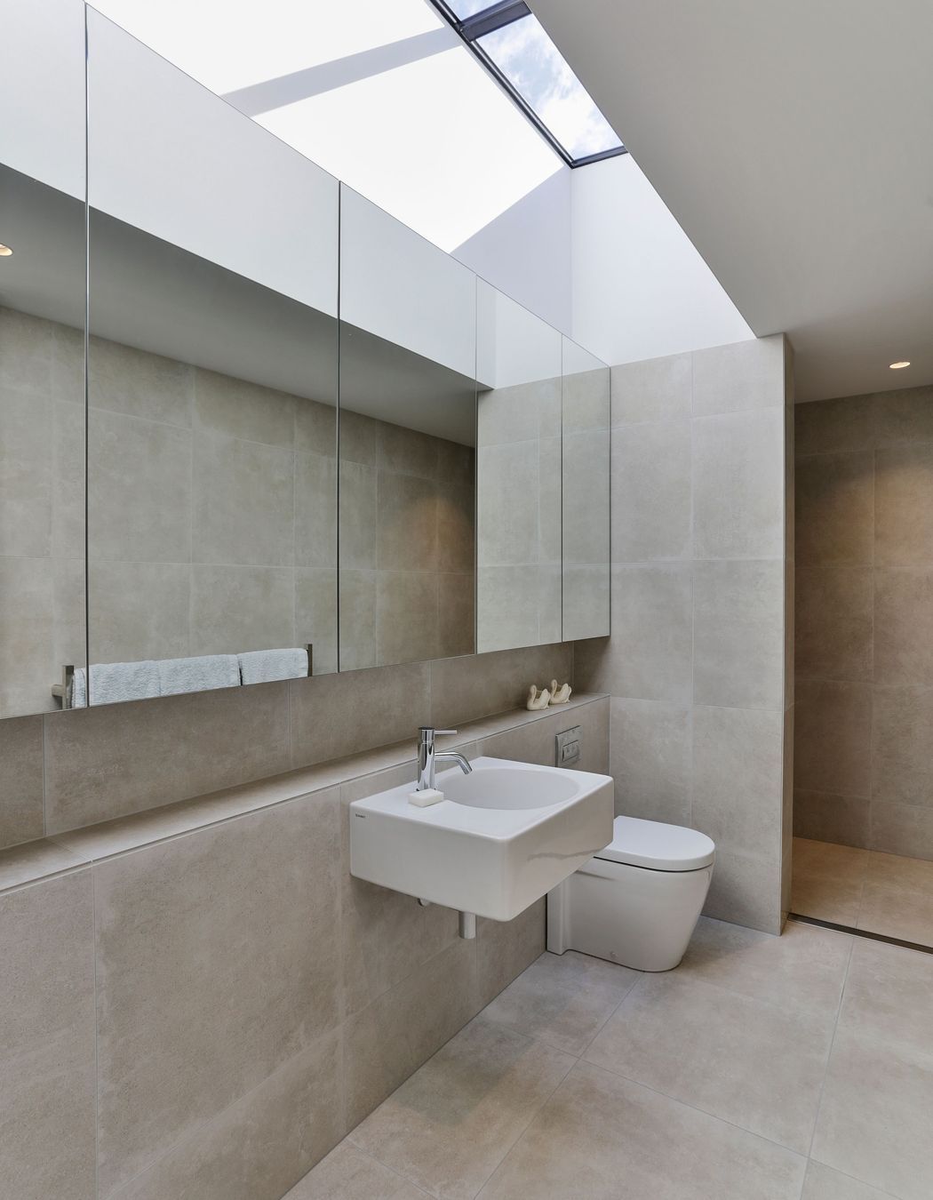 Even the upstairs bathroom has a skylight to flood the space with light.