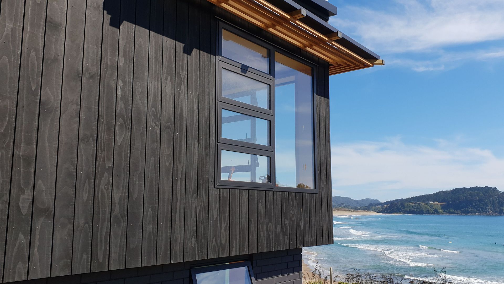 Coromandel House - Accoya stained black banner