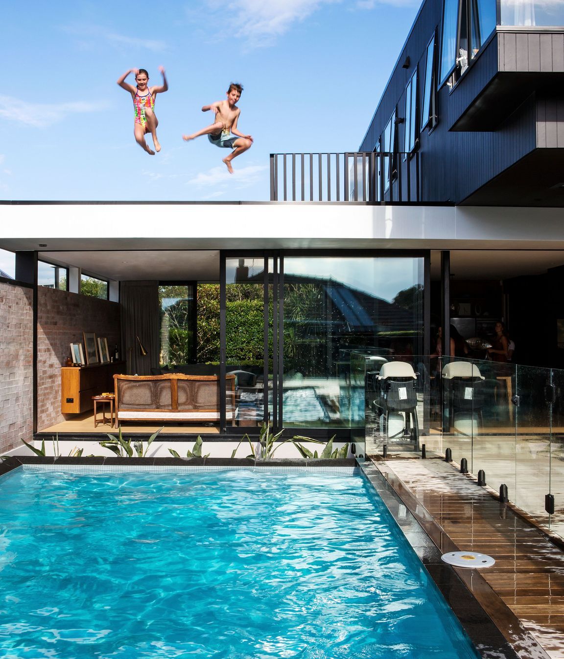 Inspired by the iconic Stahl House* in California, where the kids can jump straight off the roof into the pool.
