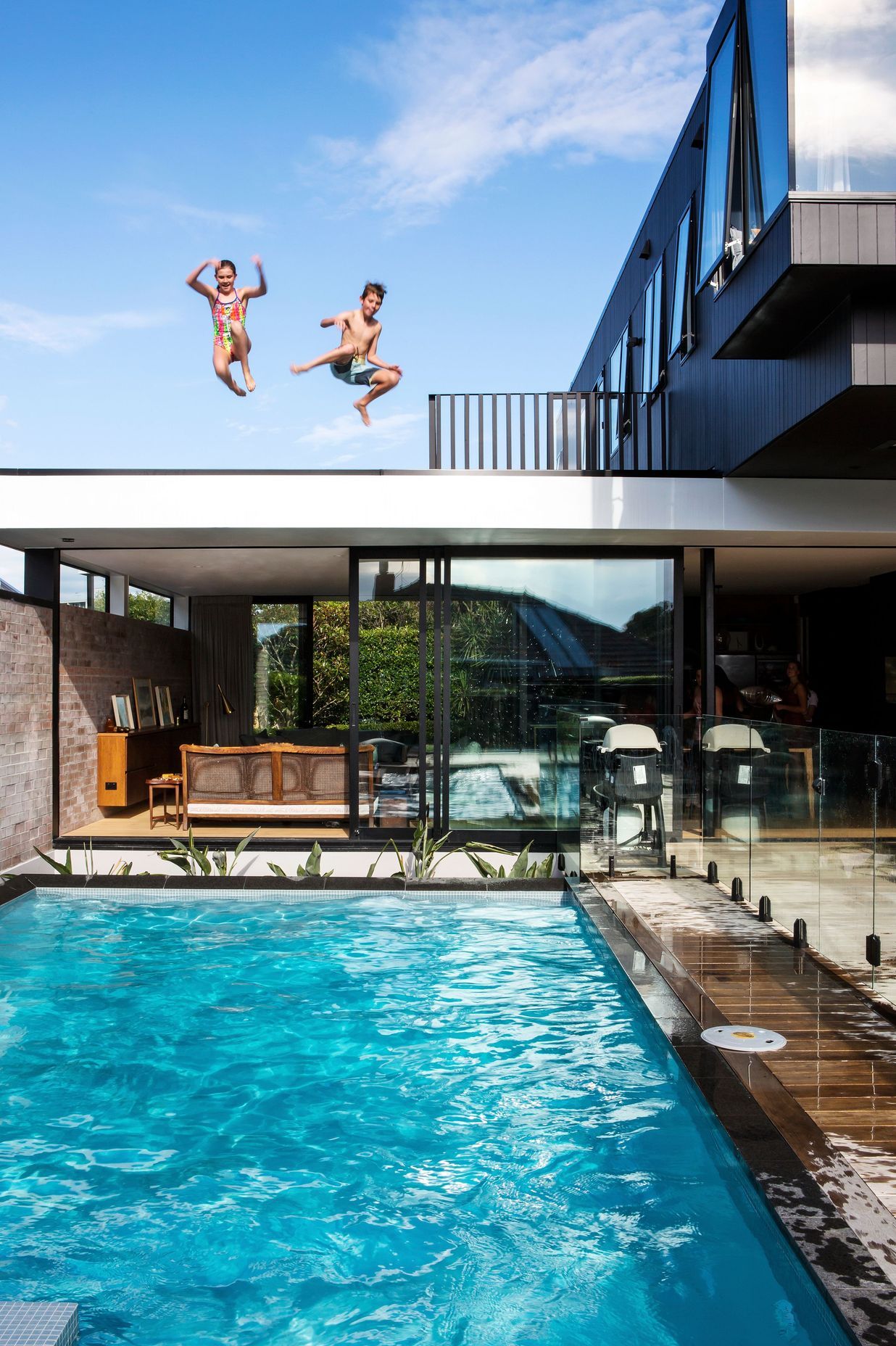 Inspired by the iconic Stahl House* in California, where the kids can jump straight off the roof into the pool.