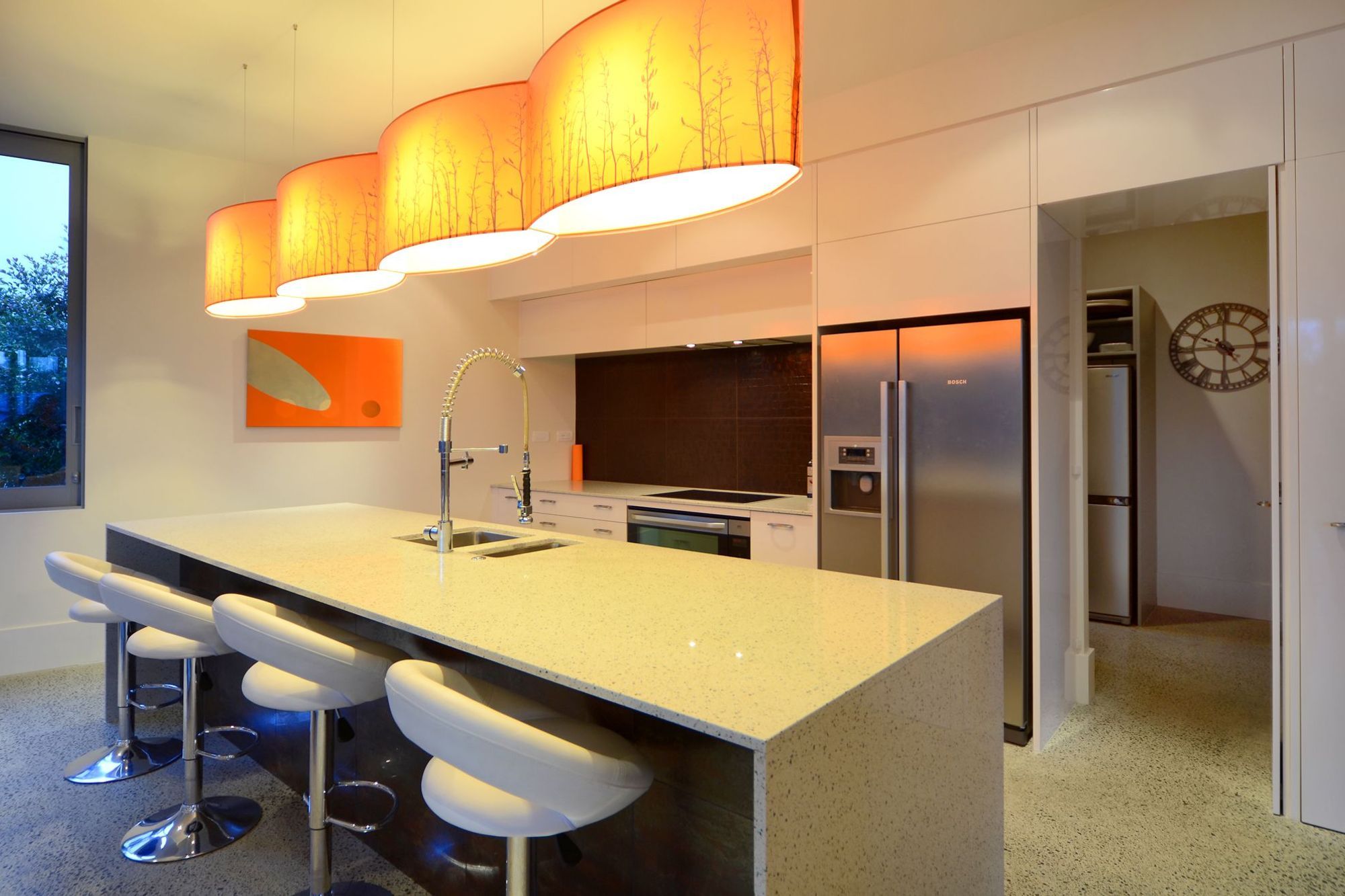 A butlers pantry leads off the kitchen.