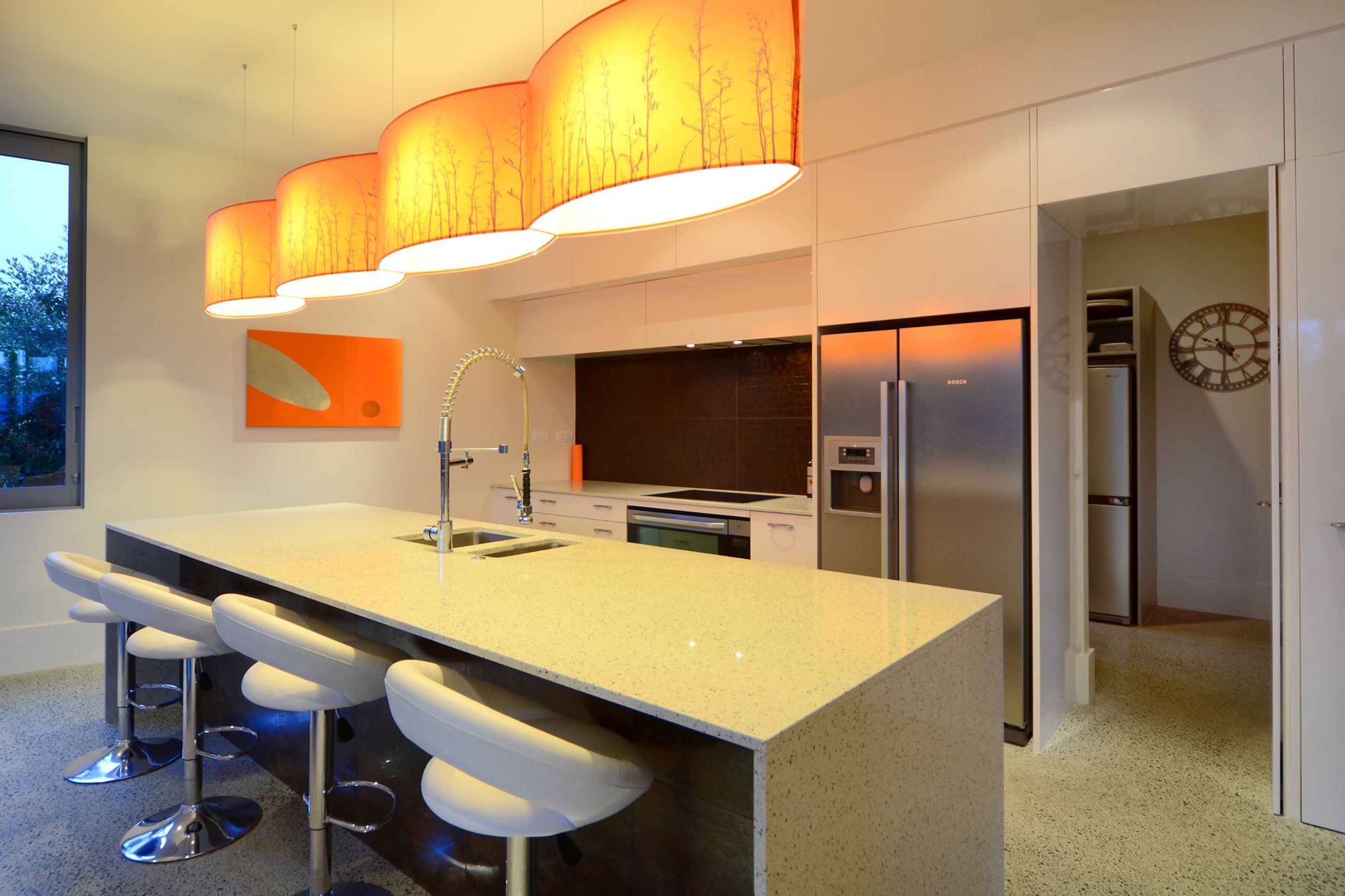 A butlers pantry leads off the kitchen.