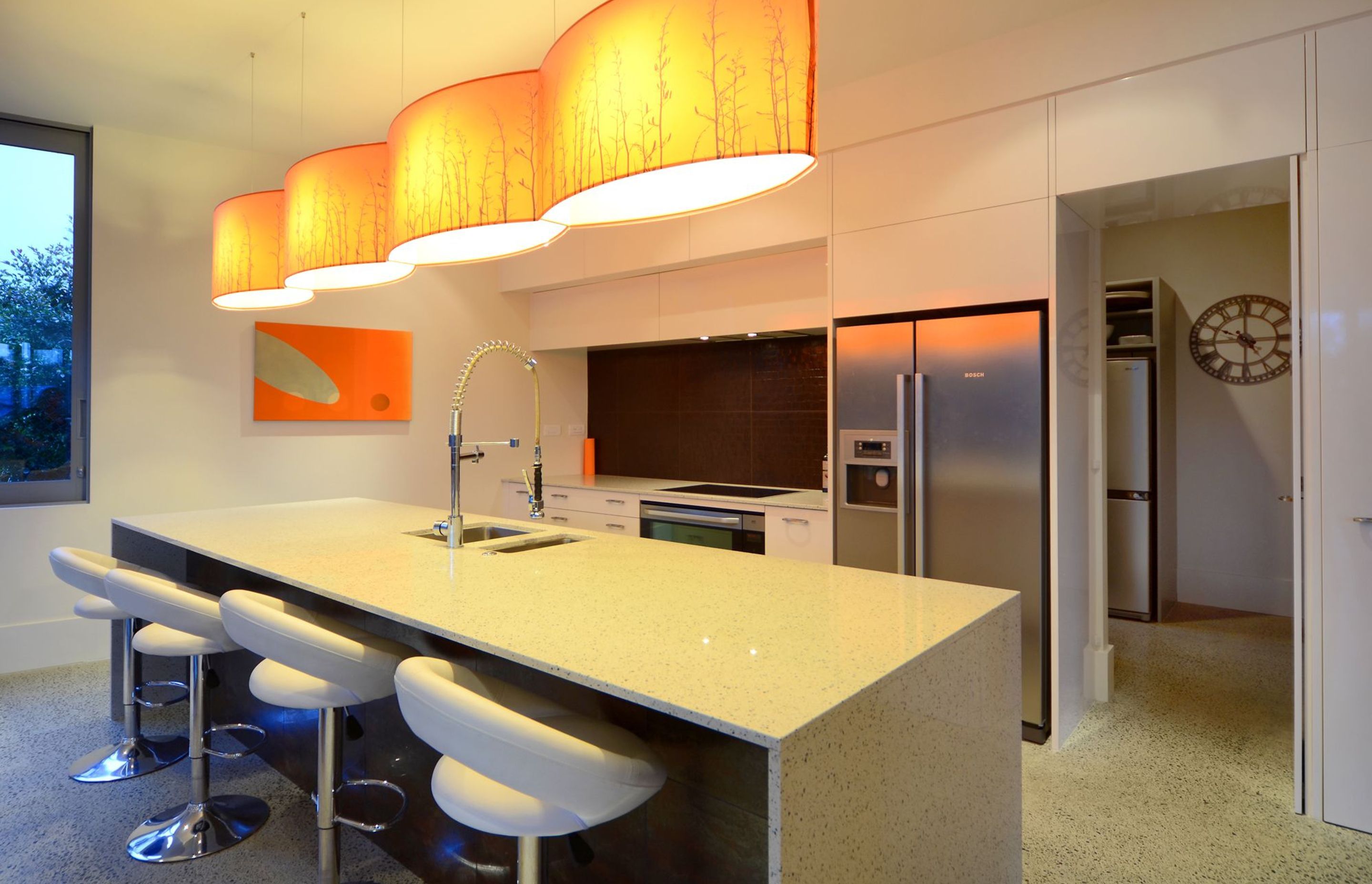 A butlers pantry leads off the kitchen.