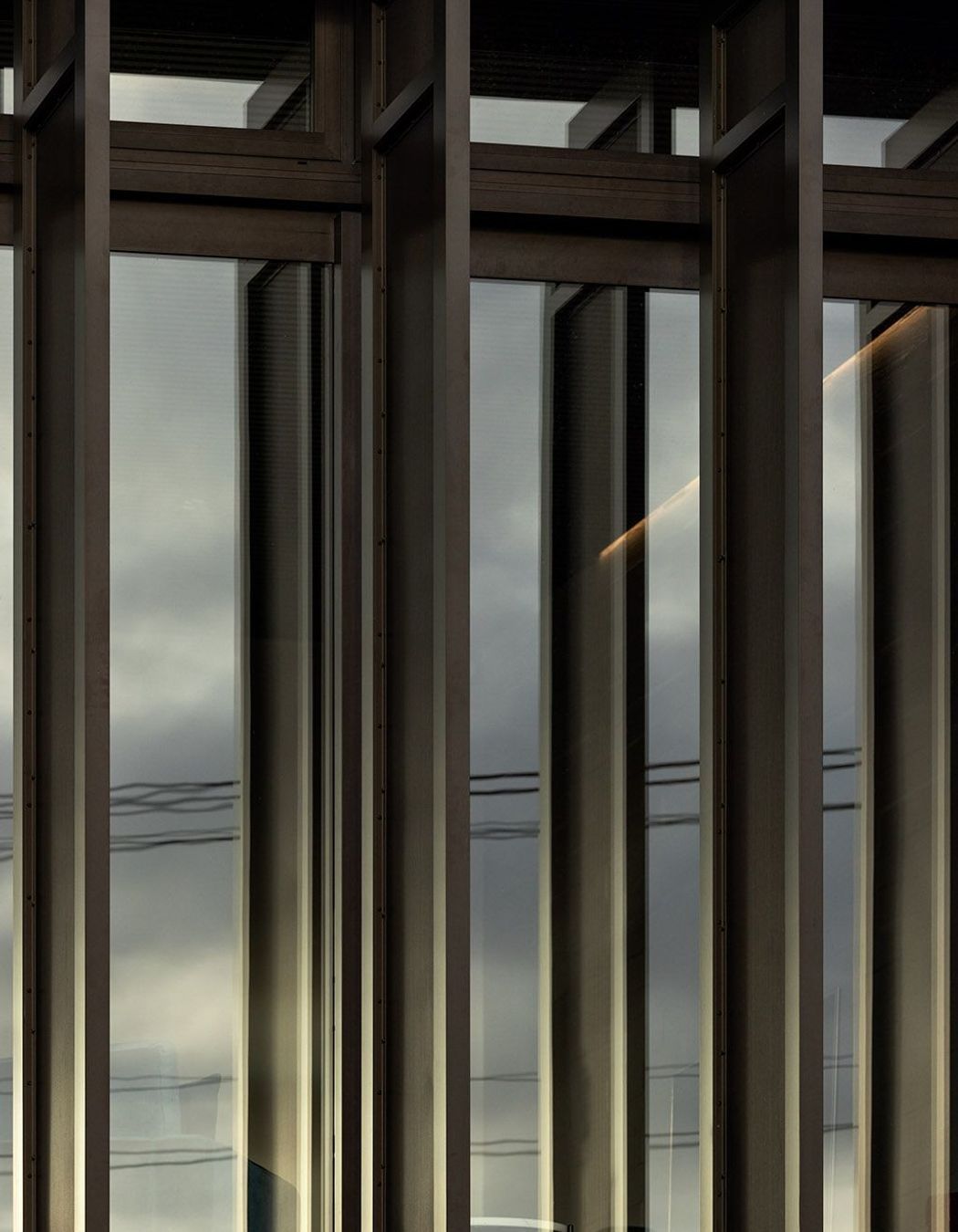 Perforated aluminium screens allow for differing levels of light to be achieved