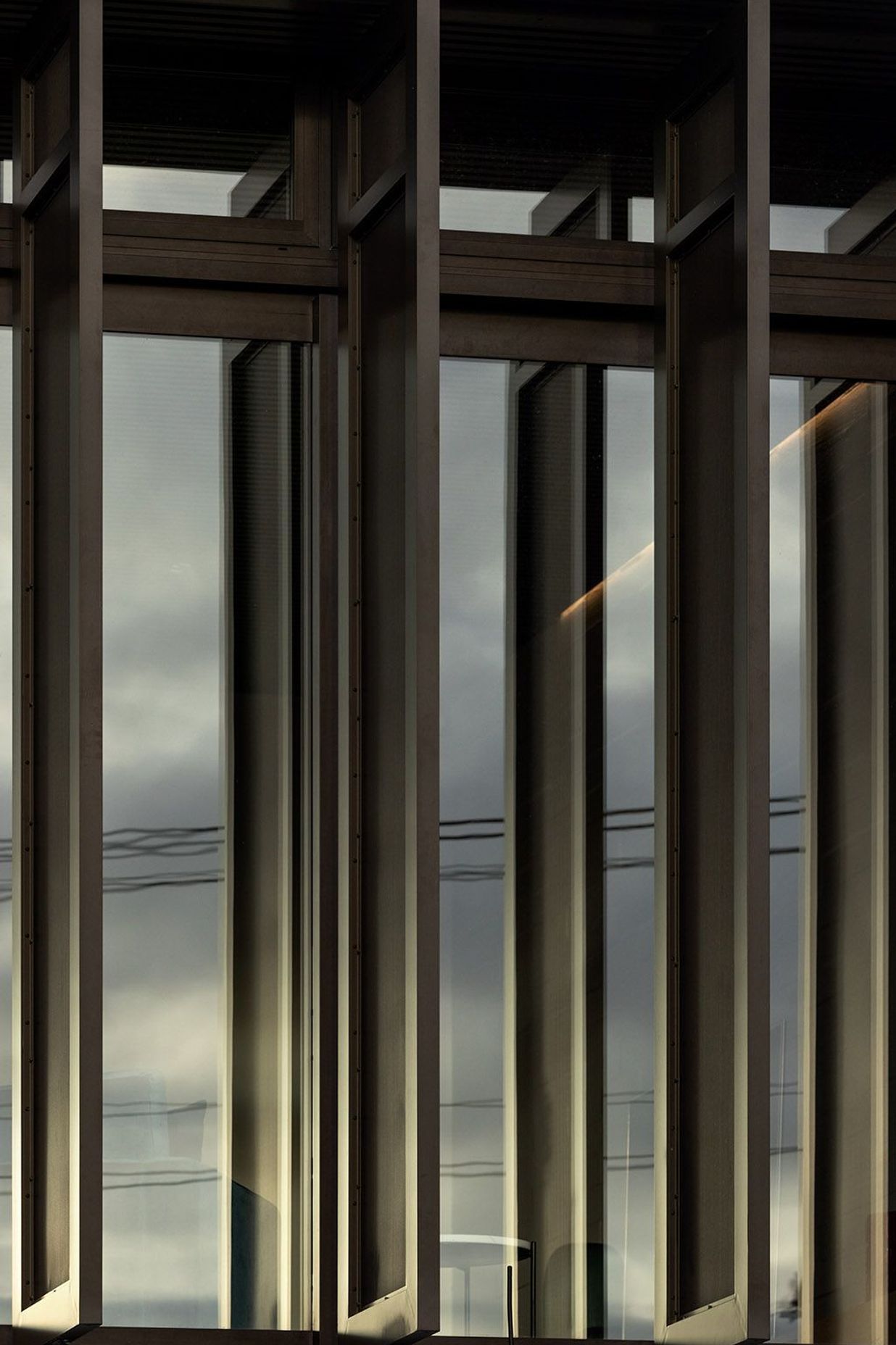 Perforated aluminium screens allow for differing levels of light to be achieved