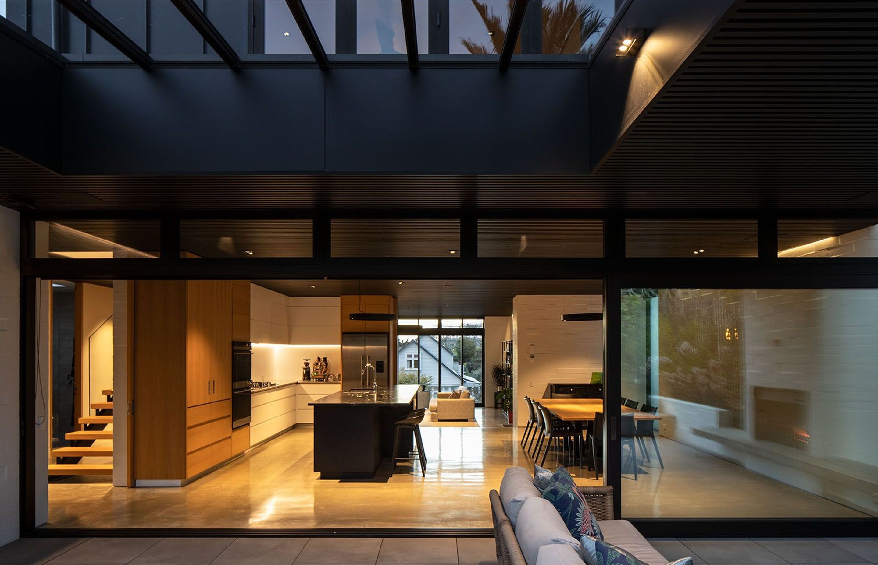 Thanks to a bespoke cedar ceiling with acoustic panels above it, the house feels quiet despite often being a busy place with different agegroups congregating in the same area.