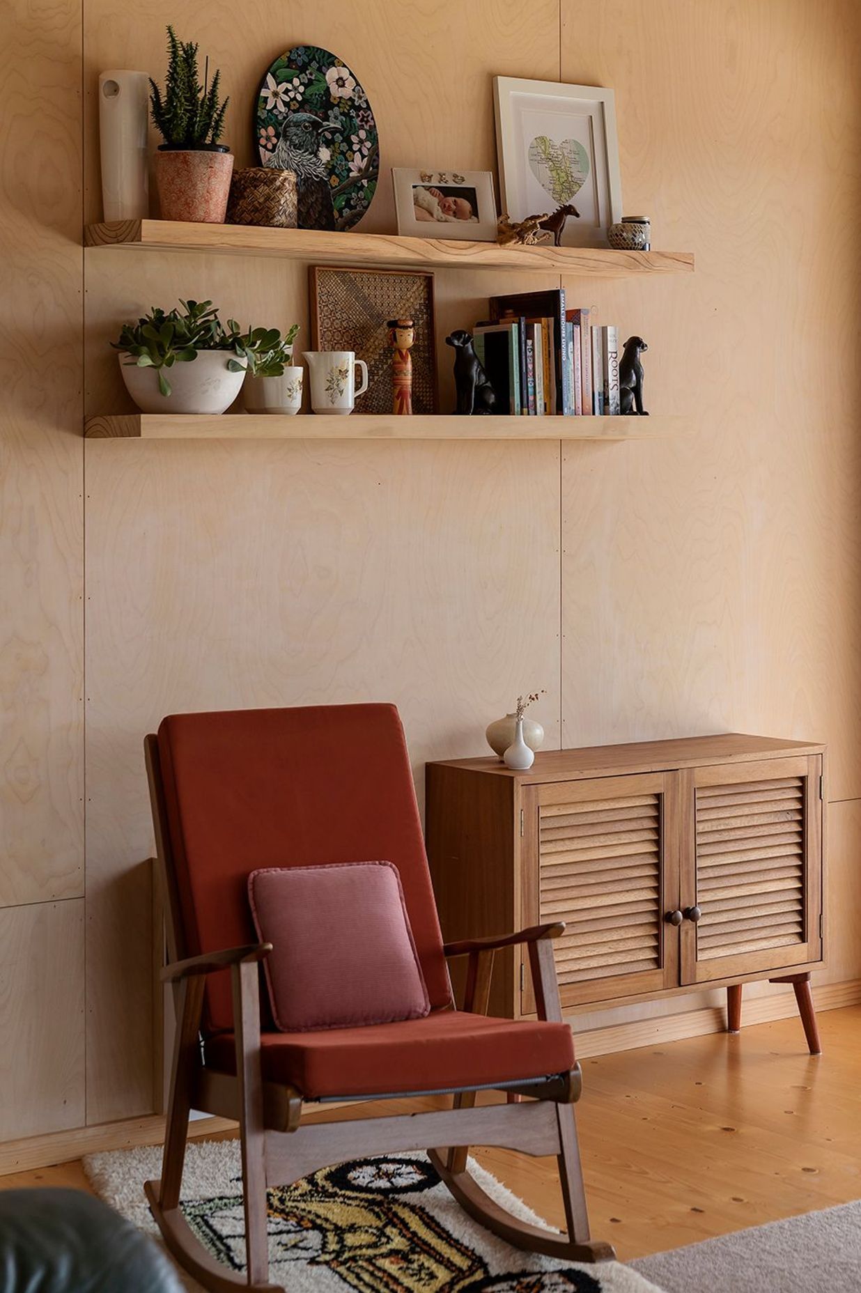 Plywood lines the interior spaces, providing a warm backdrop for vintage furntiture.