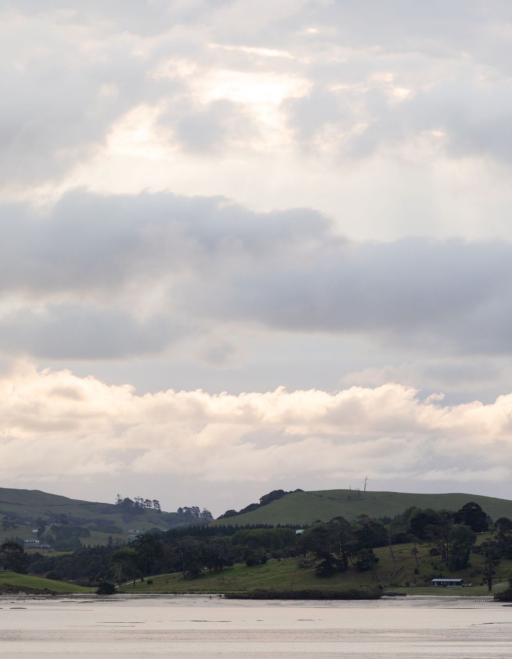 The harbour and bush-clad hills create an idyllic setting. 