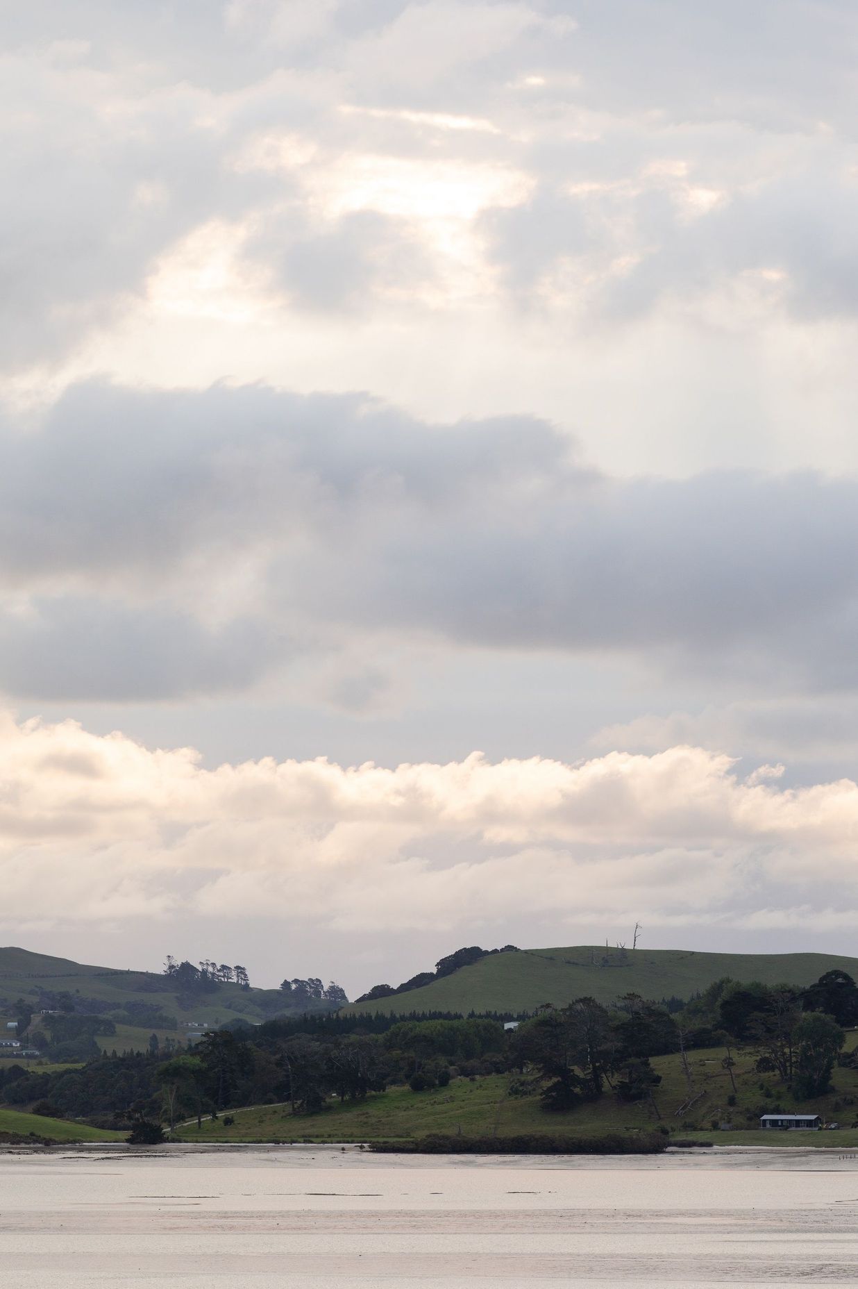 The harbour and bush-clad hills create an idyllic setting. 