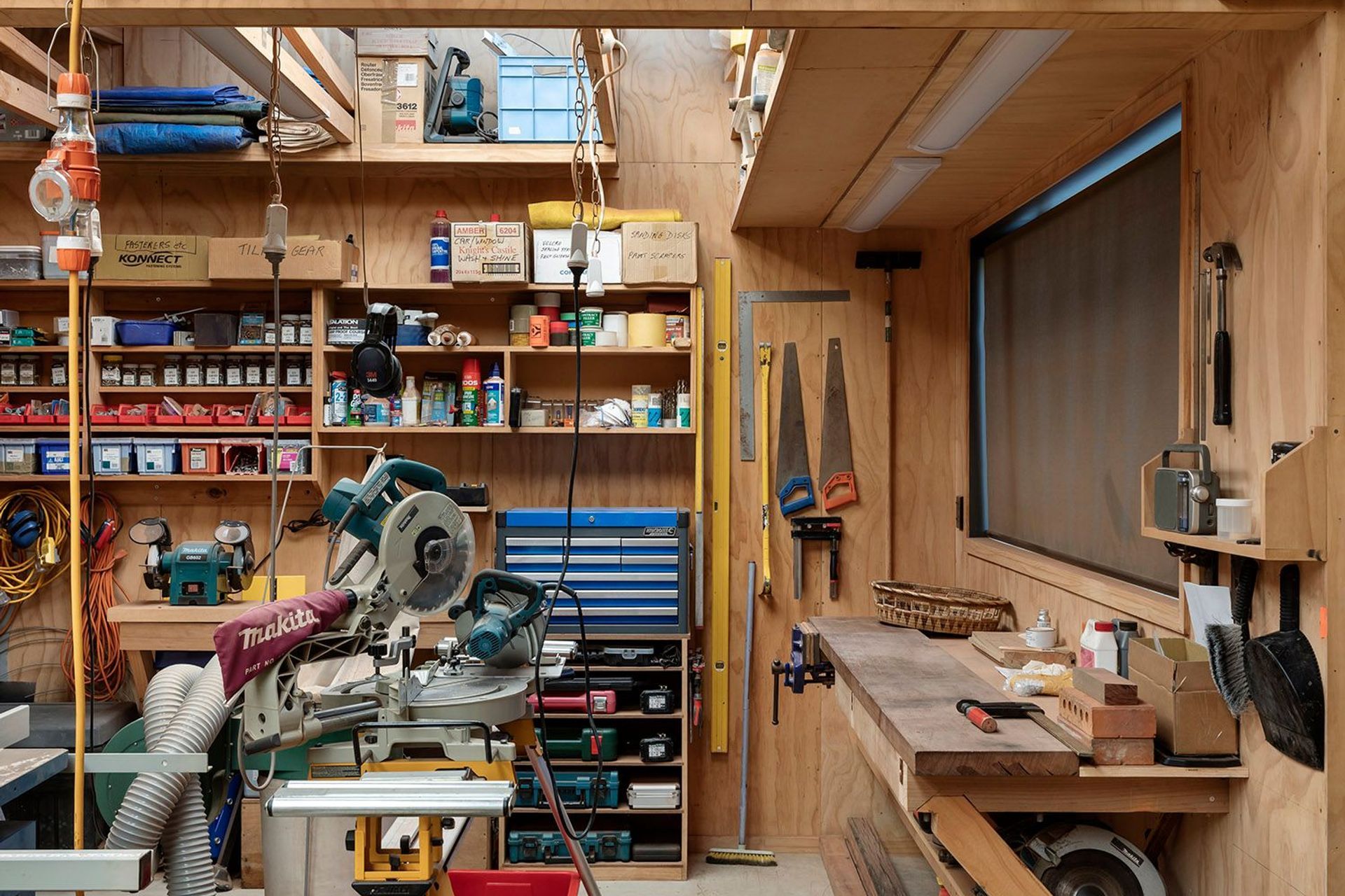 The house needed to incorporate the clients' passions and this was realised in a full woodwork workshop as well as a separate sewing room.