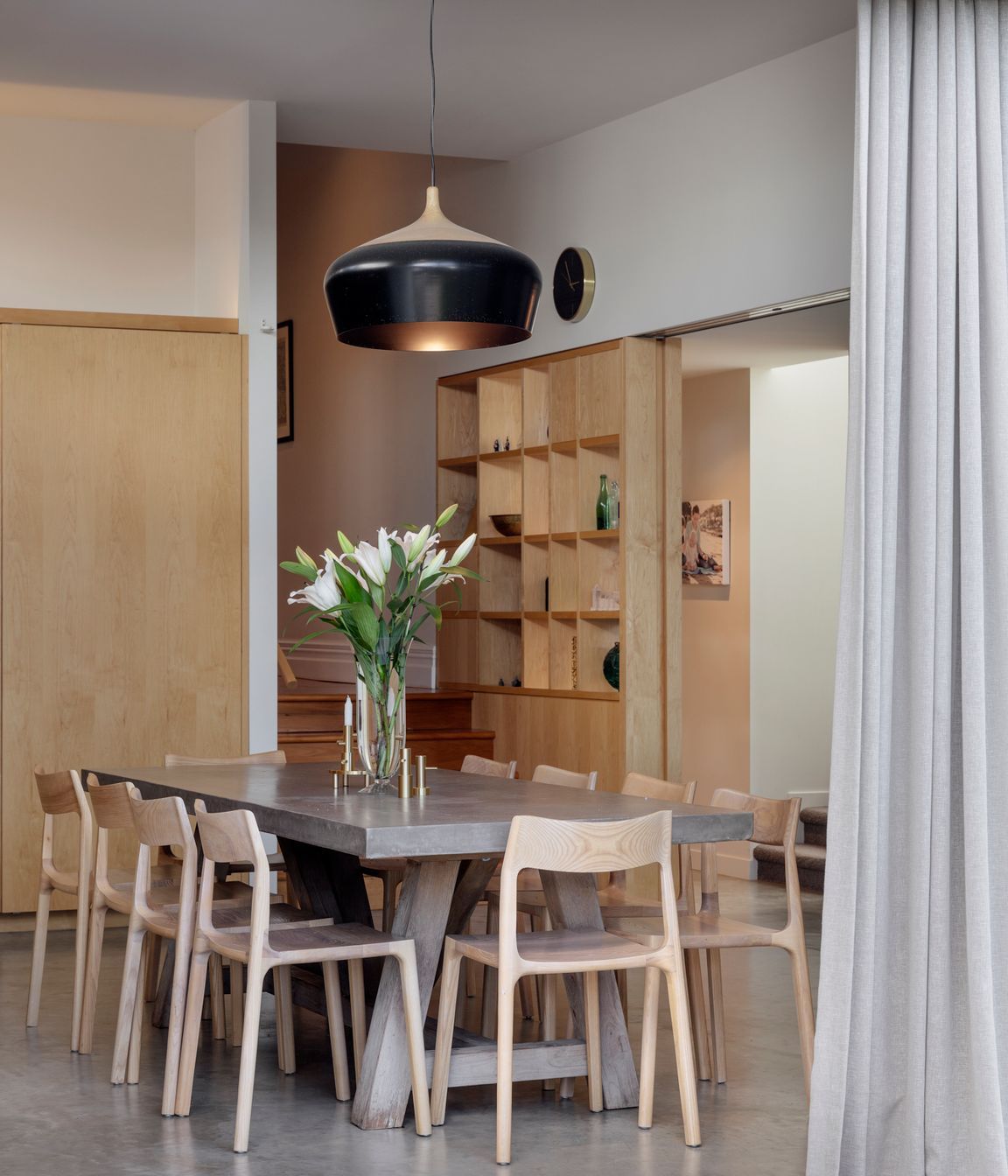 Large sliding doors open up the dining area to the garden.
