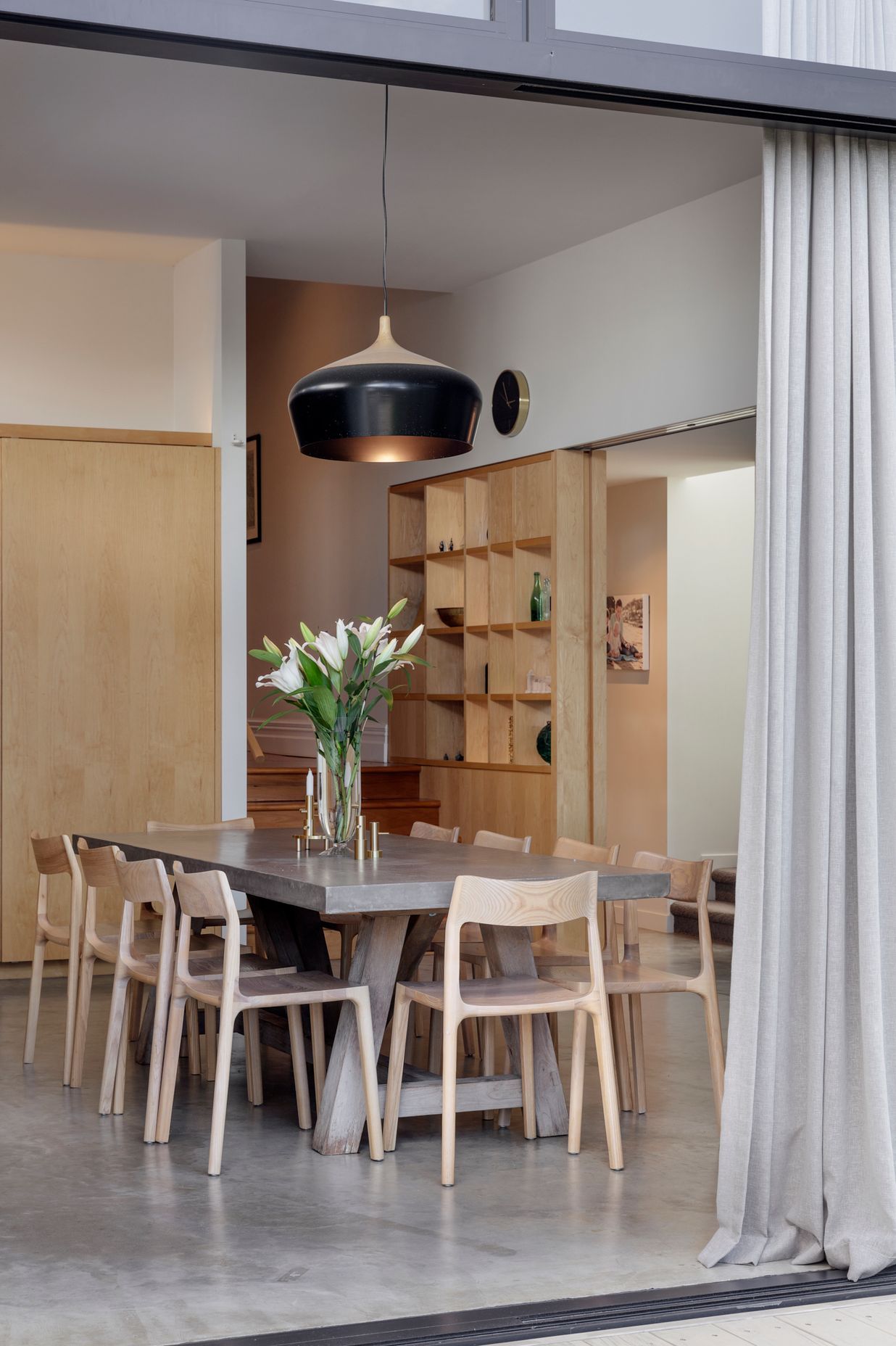 Large sliding doors open up the dining area to the garden.