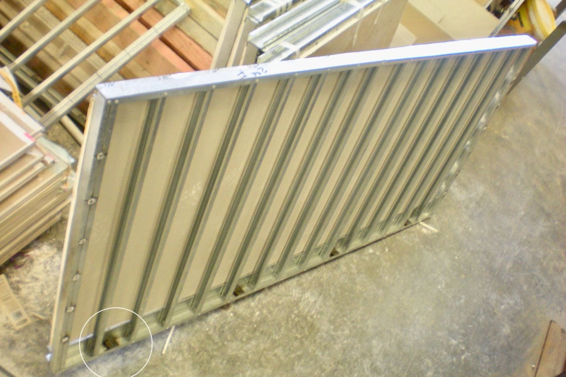 Light steel framed wall incorporating proprietary inter-module connection devices
