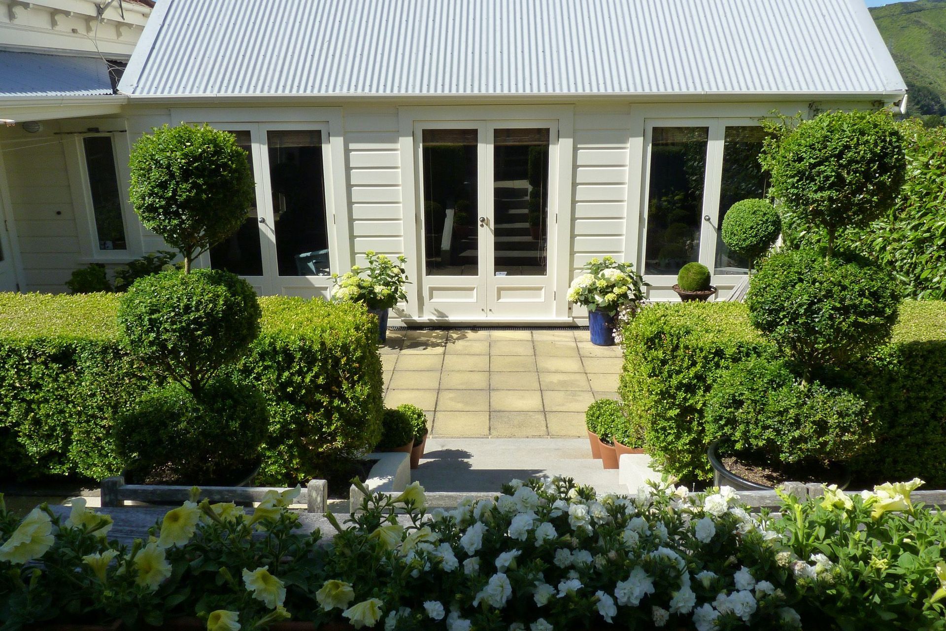 Looking back to French doors opening onto courtyard