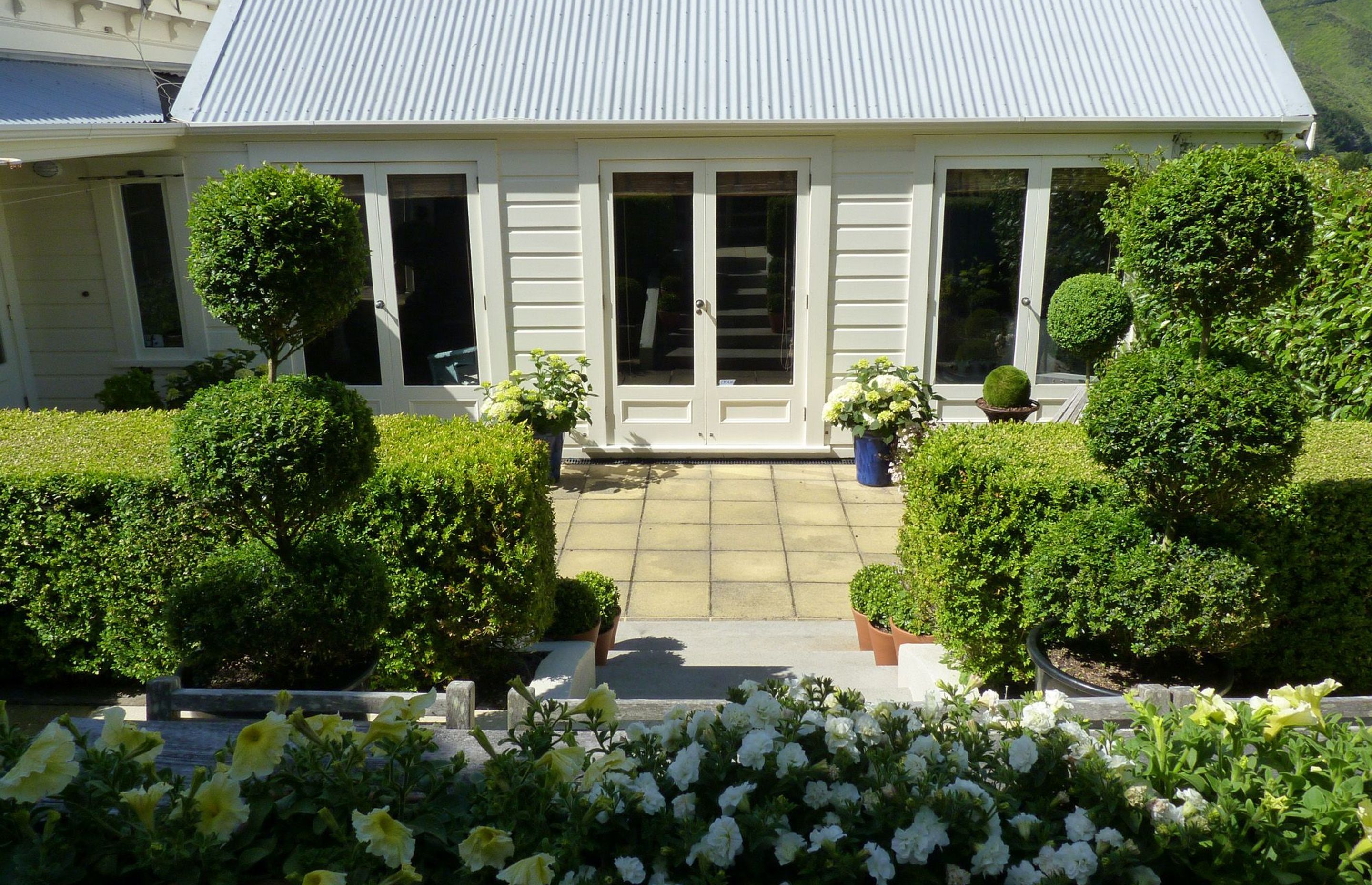 Looking back to French doors opening onto courtyard