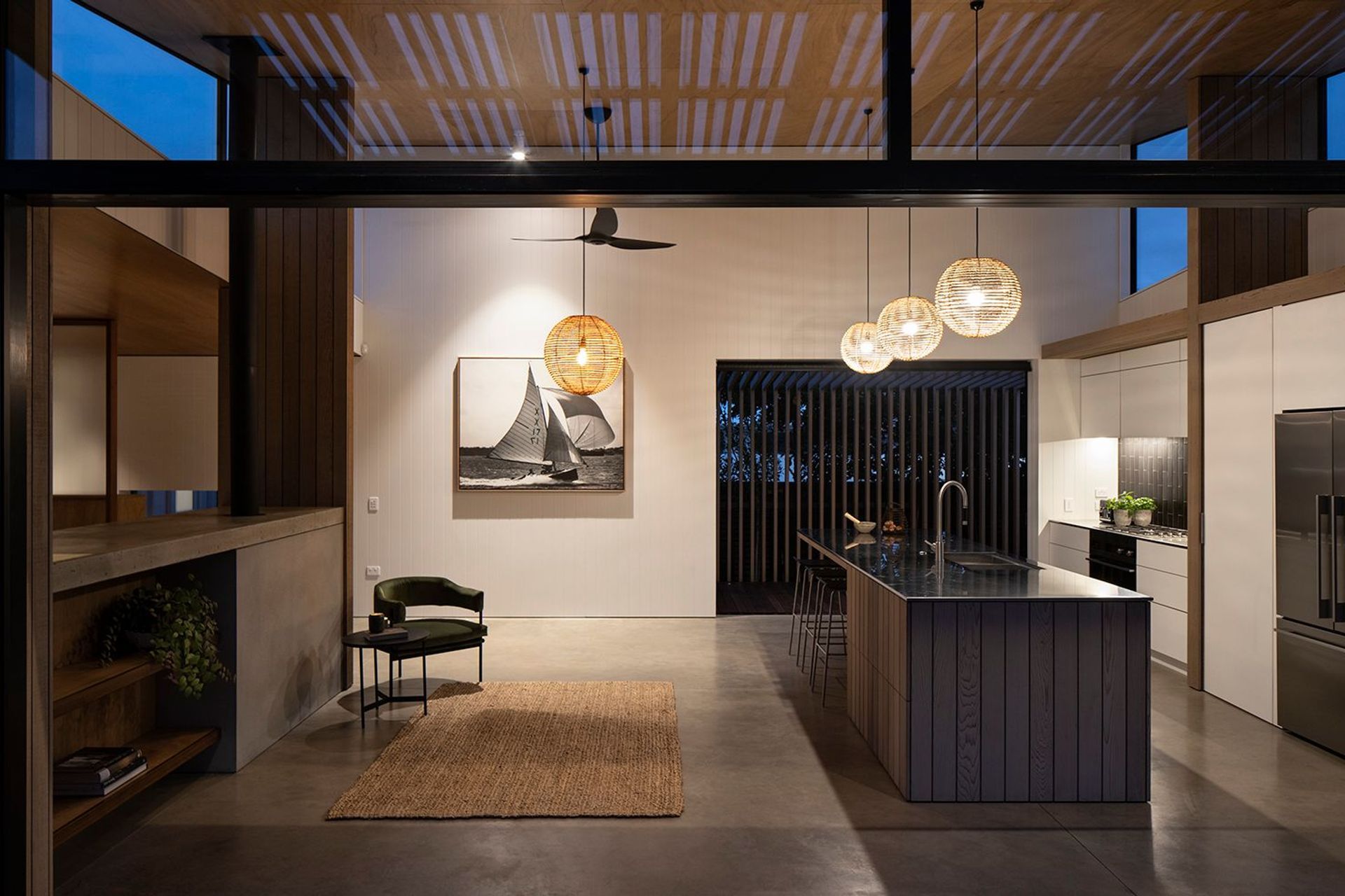 A photograph of the renowned Flying Cloud racing yacht takes pride of place on the wall in the kitchen area.