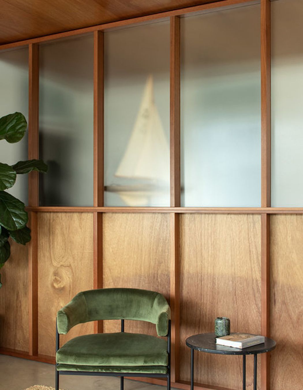 Timber panellng contrasts the white walls, adding warmth to the neutral colour scheme.