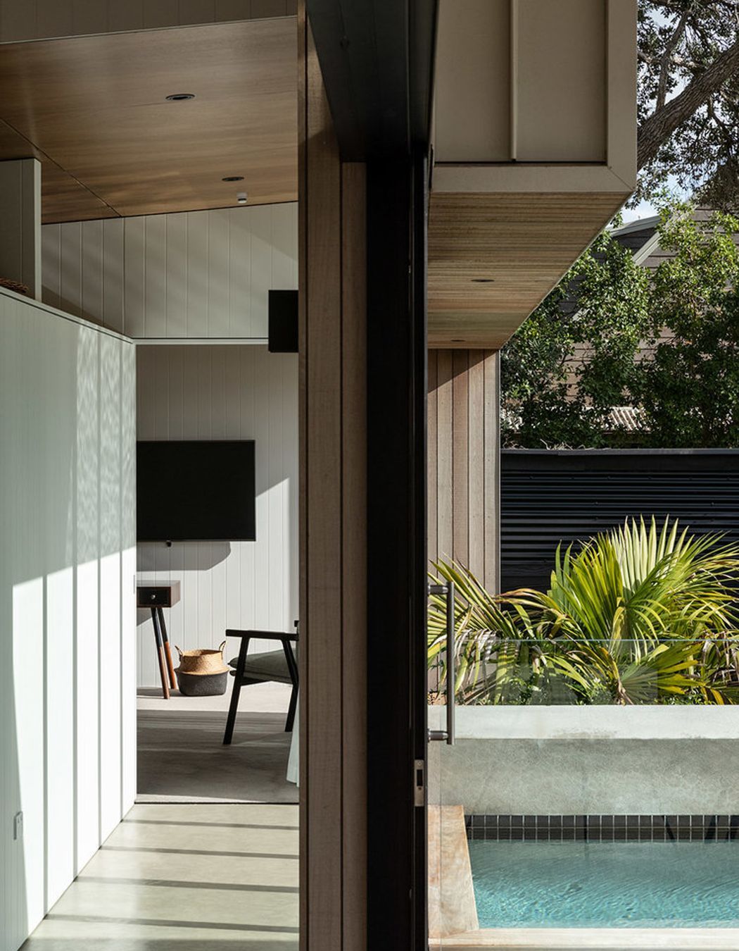 The corridor to the master bedroom suite, with the scullery and pool on either side.