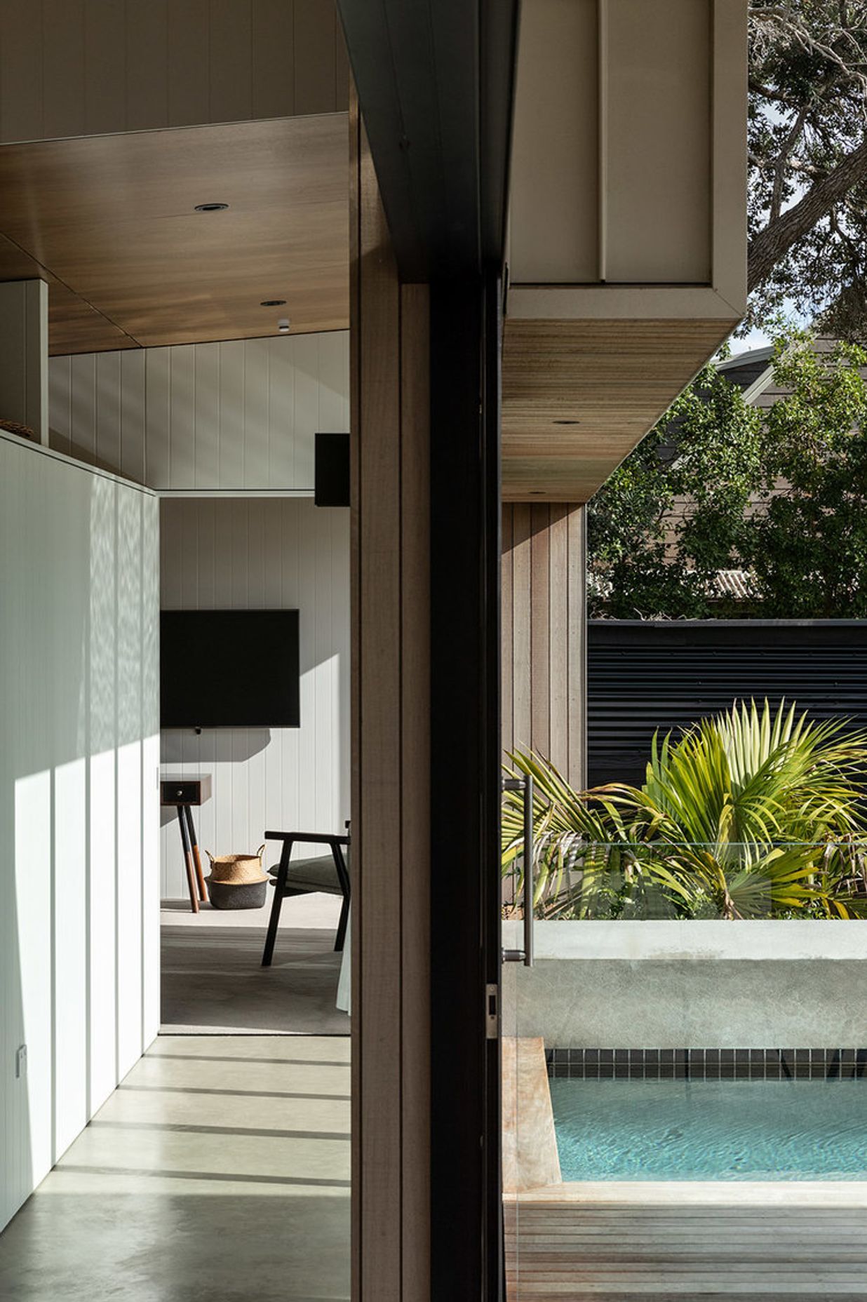 The corridor to the master bedroom suite, with the scullery and pool on either side.