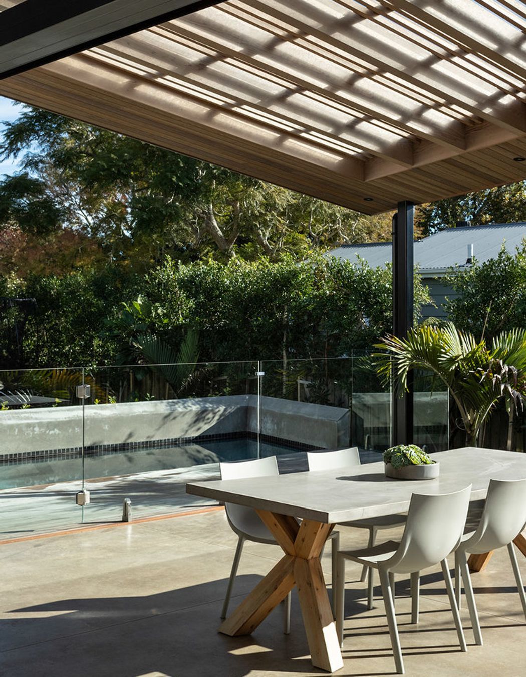 Strategic planting has created a private outdoor entertainment area.