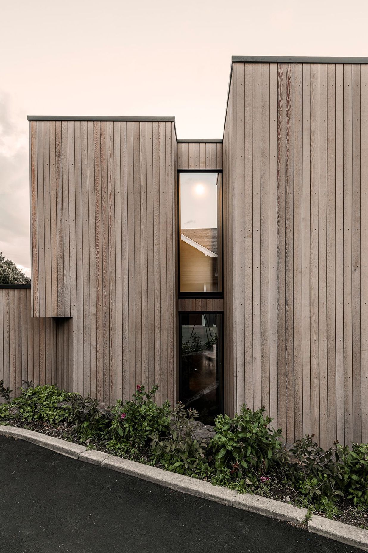 Tall windows and skylight draw plenty of natural light into the home.
