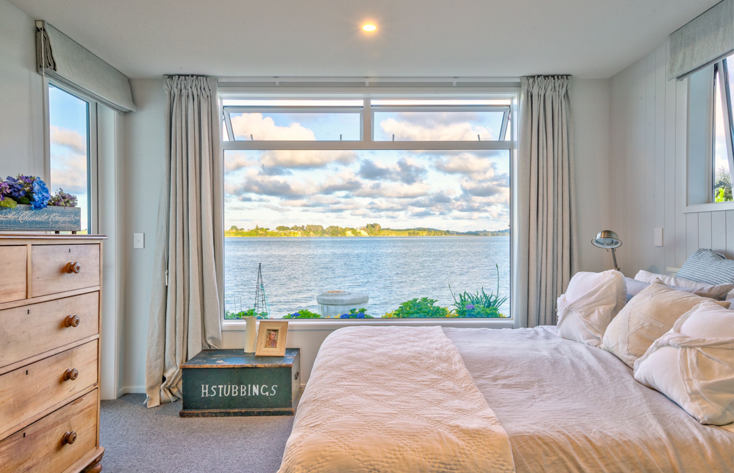 Master suite has incredible harbour views; a space of peace and serenity.