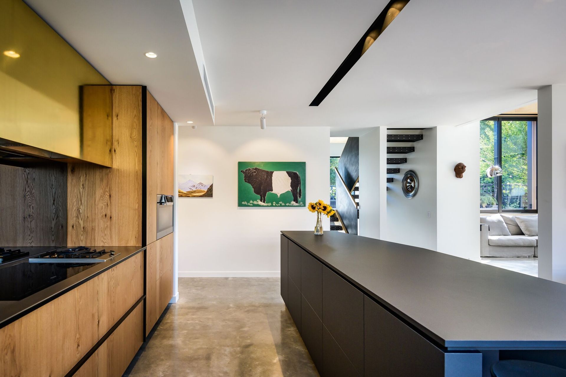 The long kitchen island is a sculptural feature of the house that's ideal for making longer lengths of pasta, says the architect and homeowner Tim Dagg.